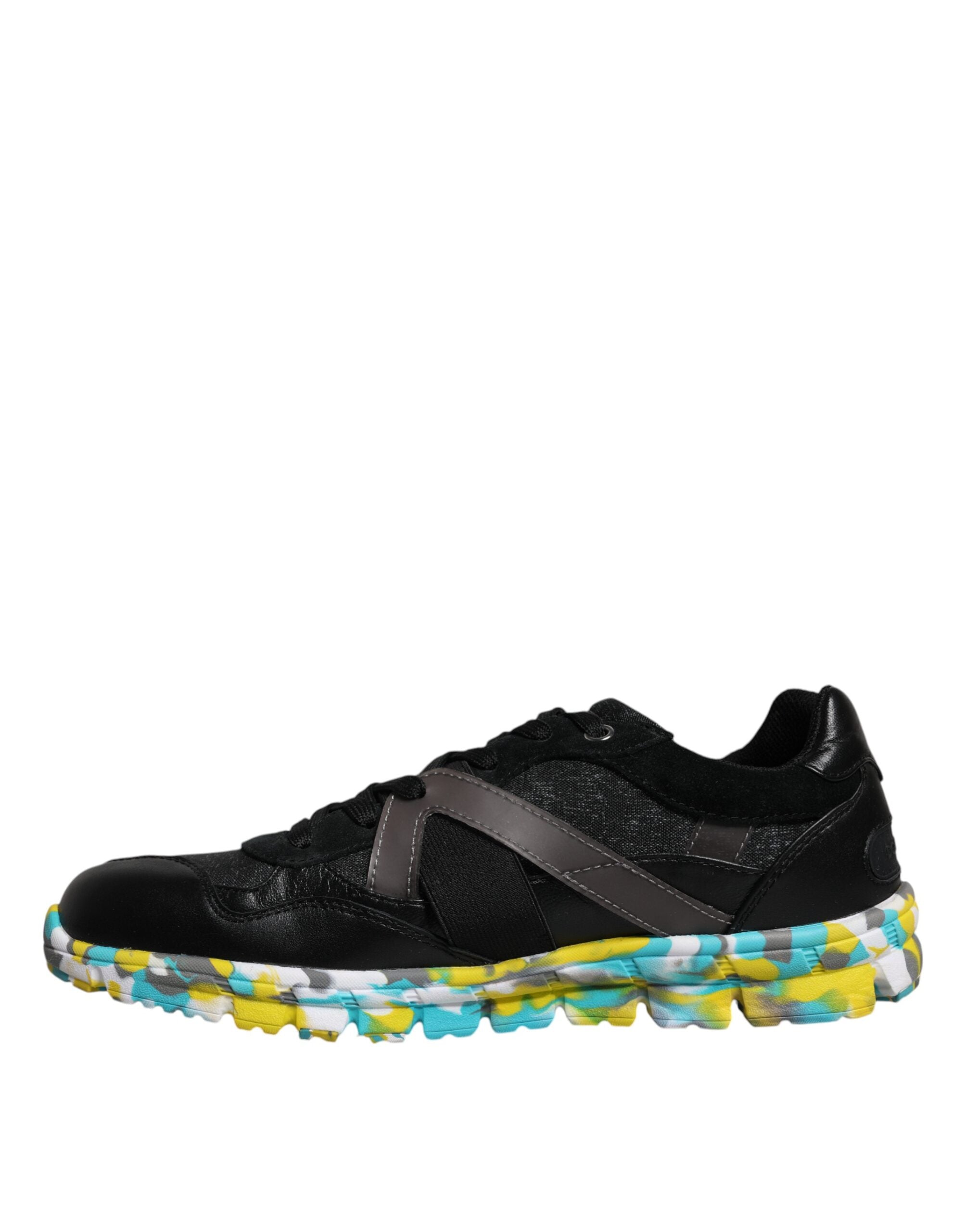 Elevate your style with Dolce & Gabbana's Black Polyester Low Top Sneakers, where exquisite craftsmanship meets luxurious materials for the discerning individual.