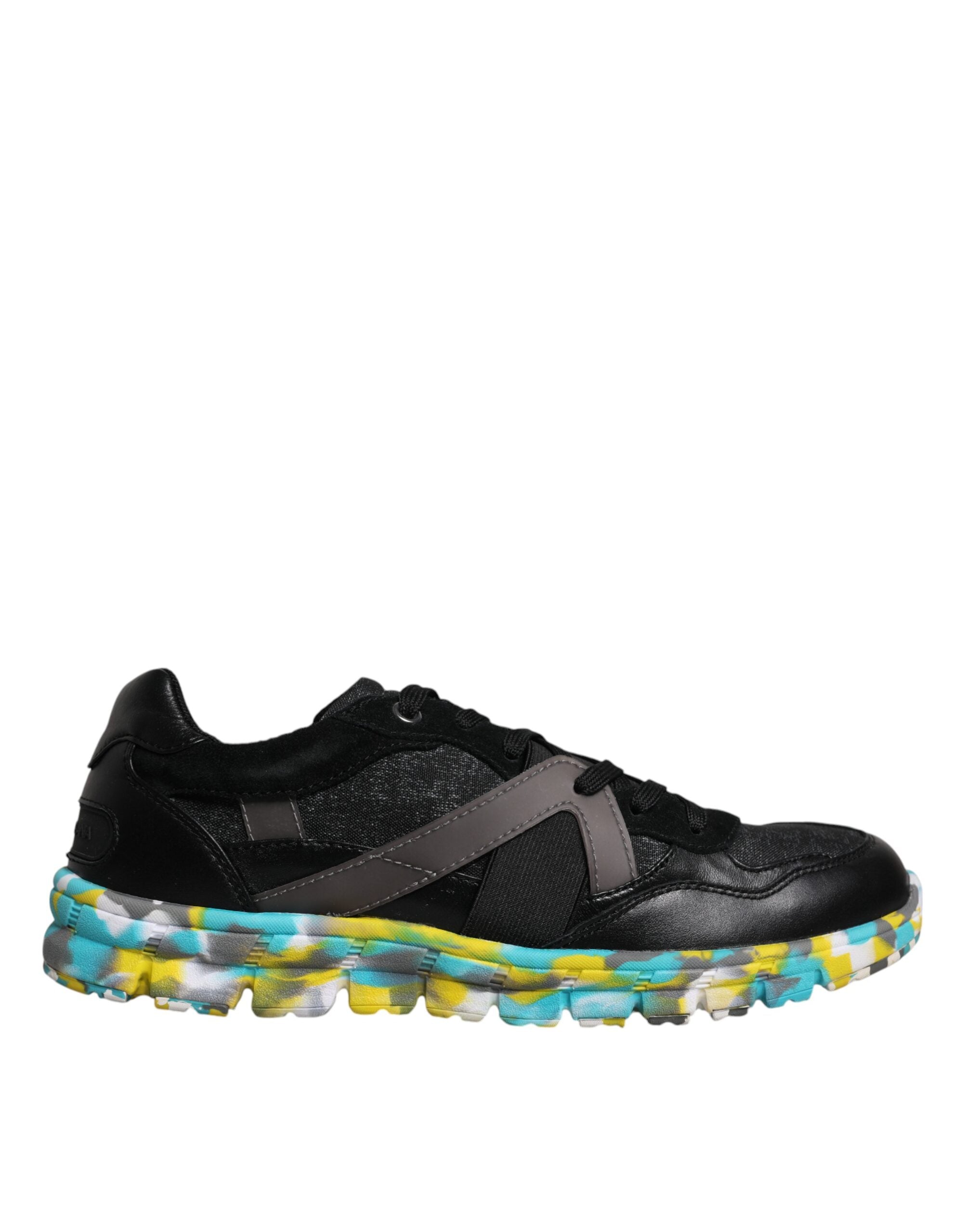 Elevate your style with Dolce & Gabbana's Black Polyester Low Top Sneakers, a masterful blend of luxury and craftsmanship, perfect for the discerning individual.