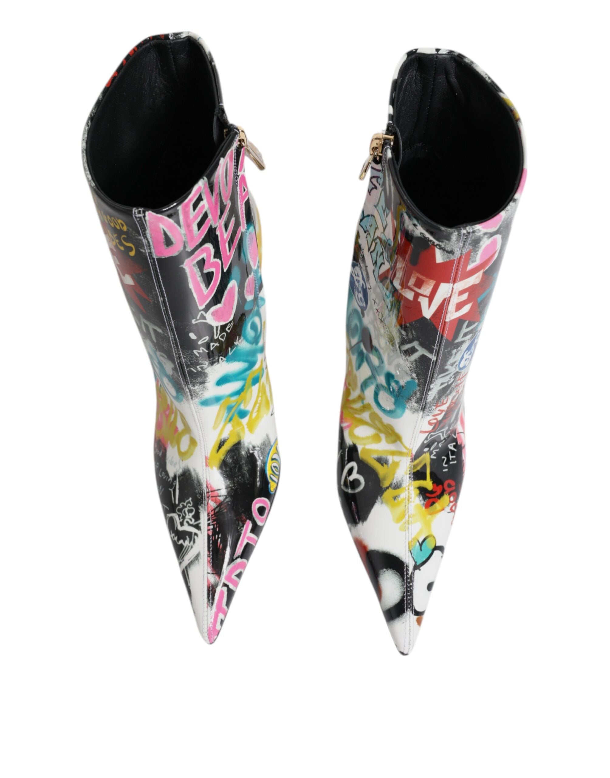 Indulge in the exquisite Dolce & Gabbana Multicolor Graffiti Keira Mid Calf Boots, crafted from sumptuous lamb leather, a bold statement of luxury and artistry for the discerning.