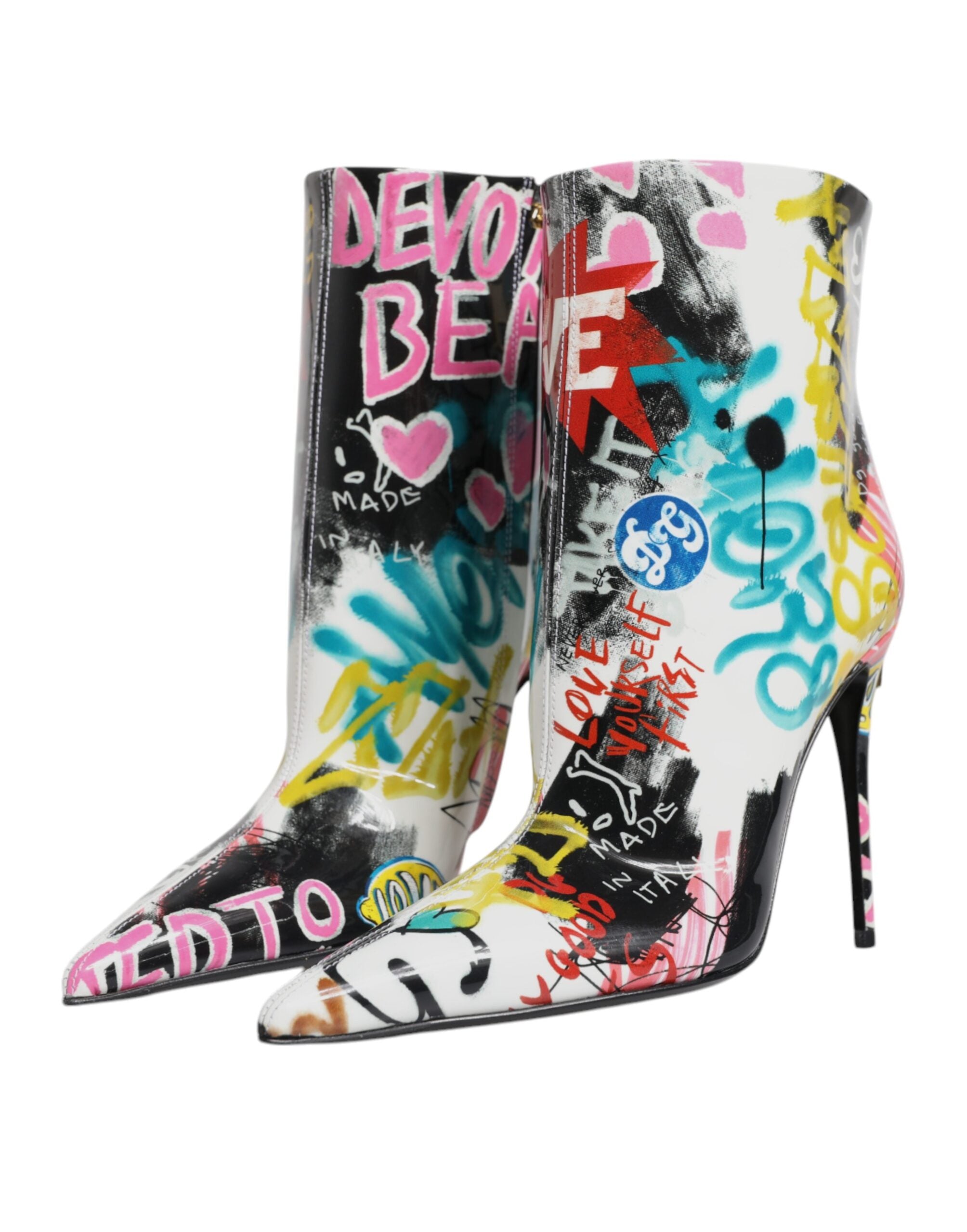 Indulge in the exquisite Dolce & Gabbana Multicolor Graffiti Keira Mid Calf Boots, crafted from sumptuous lamb leather for a bold yet elegant statement in luxury fashion.