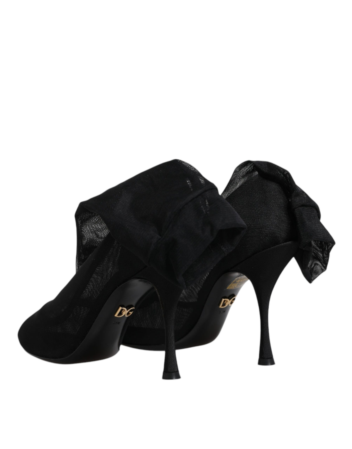 Step into unparalleled elegance with Dolce & Gabbana's Black Silk Stretch Mesh Sock Boots, a luxurious blend of silk and craftsmanship that redefines sophistication.