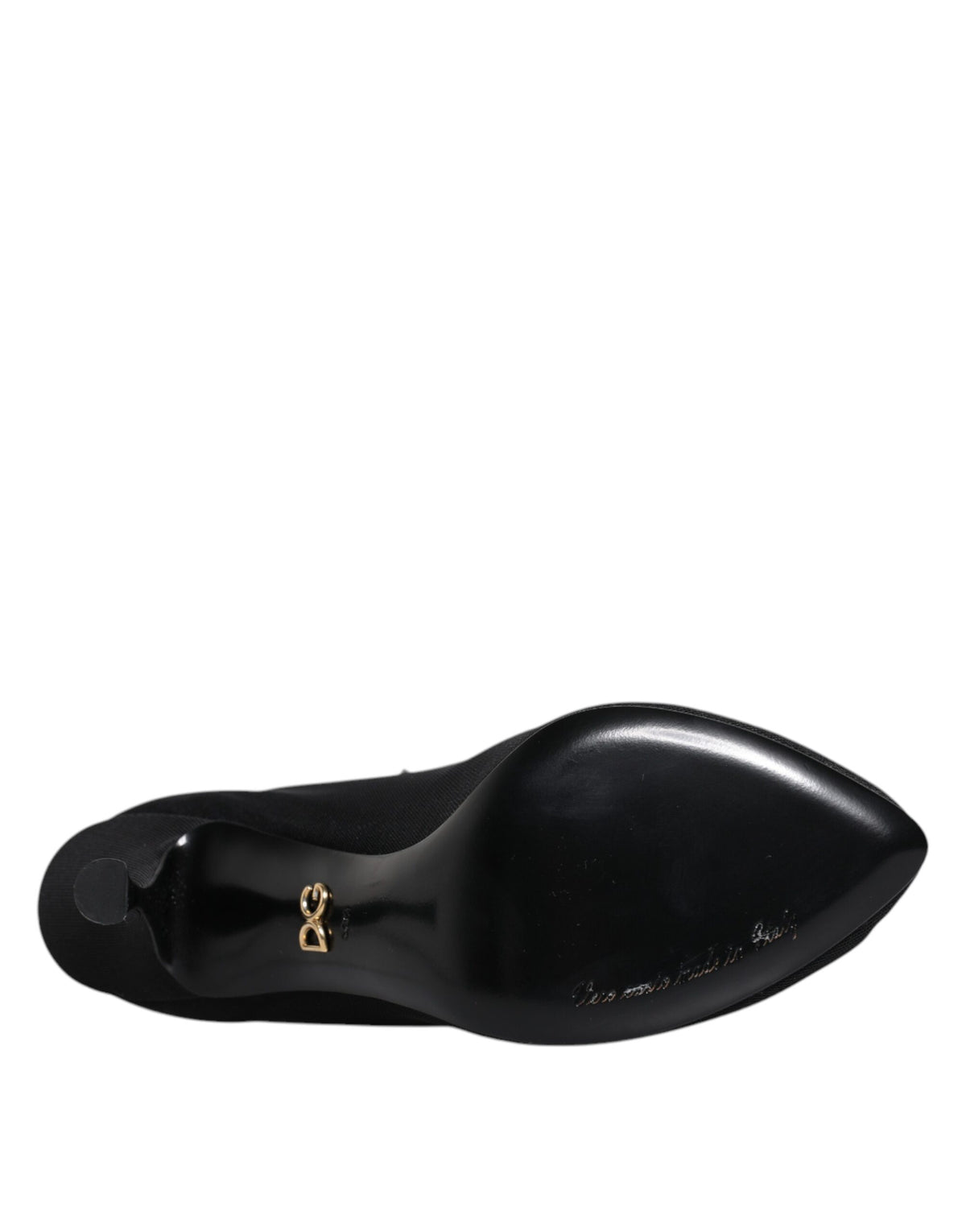 Indulge in the exquisite Dolce & Gabbana Black Silk Stretch Mesh Sock Boots, where luxurious silk and impeccable craftsmanship elevate your style to new heights of sophistication.