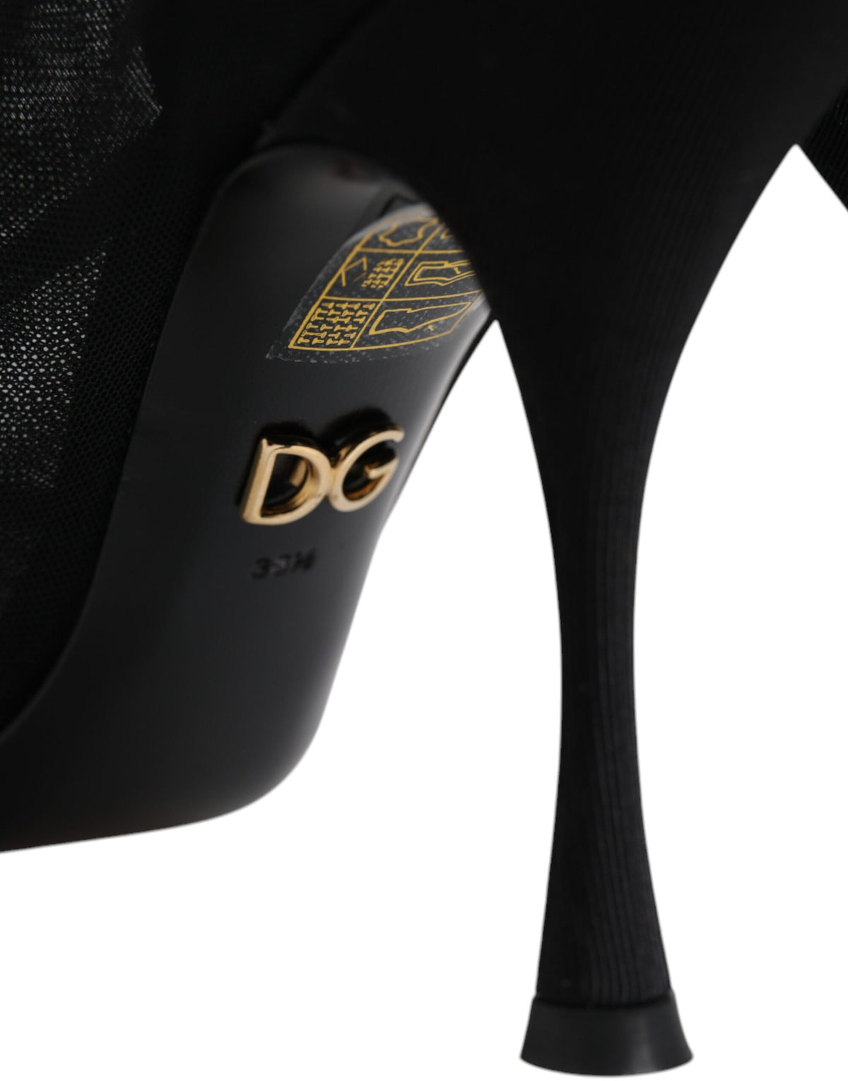 Step into timeless elegance with Dolce & Gabbana's Black Silk Stretch Mesh Sock Boots, a luxurious blend of silk and nylon that embodies sophistication and versatility.