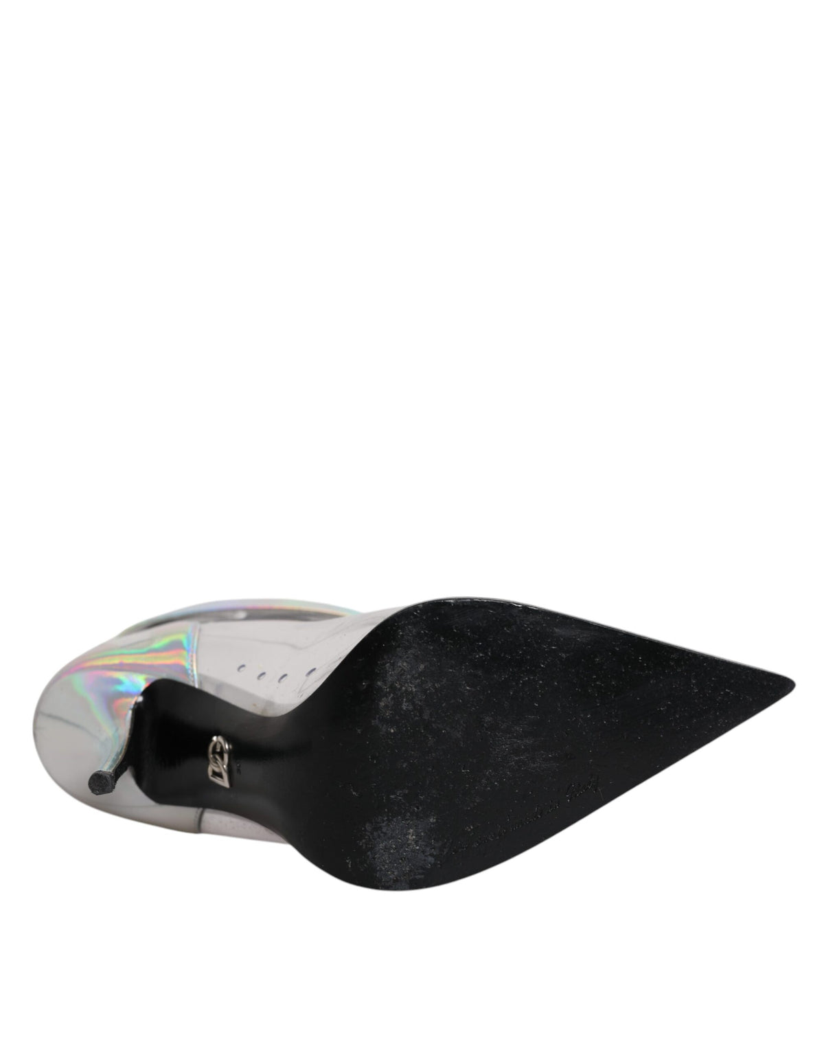 Step into the allure of Dolce & Gabbana's Silver Iridescent Pointed Short Boots, where Italian craftsmanship meets luxurious materials, perfect for the discerning fashion connoisseur.