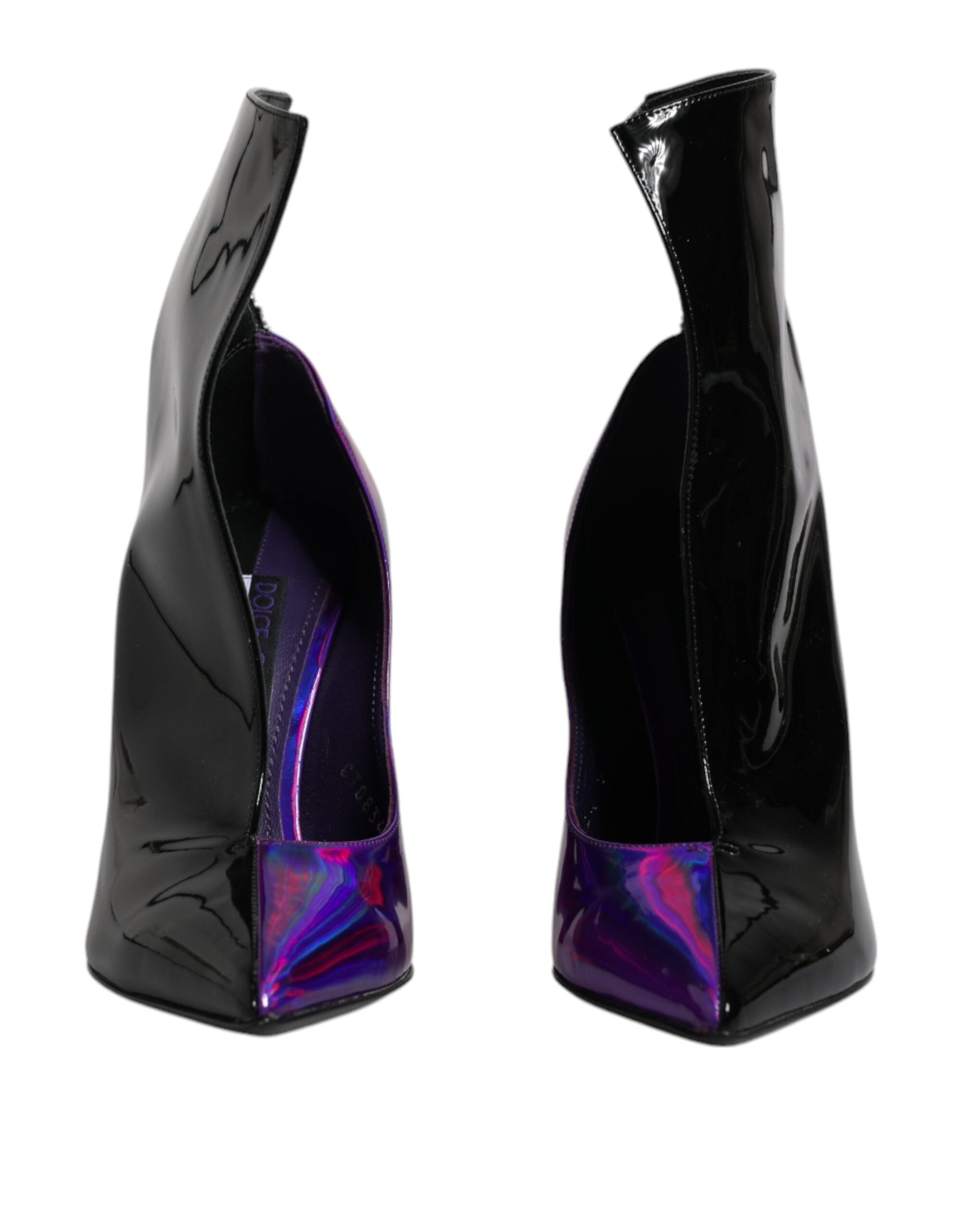 Elevate your style with Dolce & Gabbana's Purple Black Pointed Ankle Boots, crafted from exquisite leather in Italy, embodying luxury and contemporary elegance for the discerning individual.