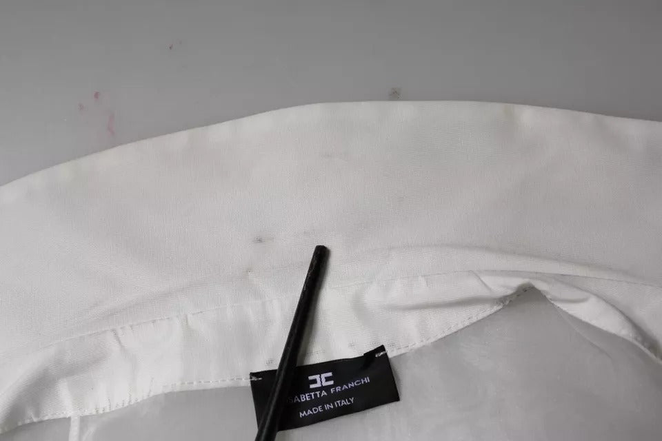 Elevate your style with the Elisabetta Franchi White Sheer Collared Top, a masterpiece of Italian craftsmanship that embodies timeless elegance and sophisticated allure.