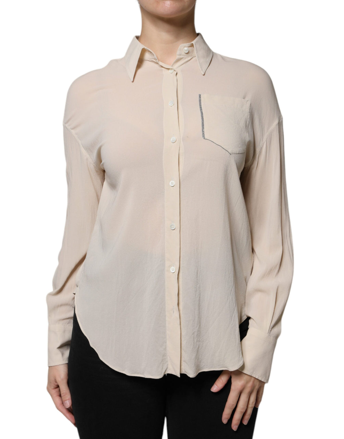 Indulge in the exquisite Brunello Cucinelli Beige Silk Blend Collared Button Down Top, a timeless masterpiece of luxury and elegance crafted from the finest silk blend.