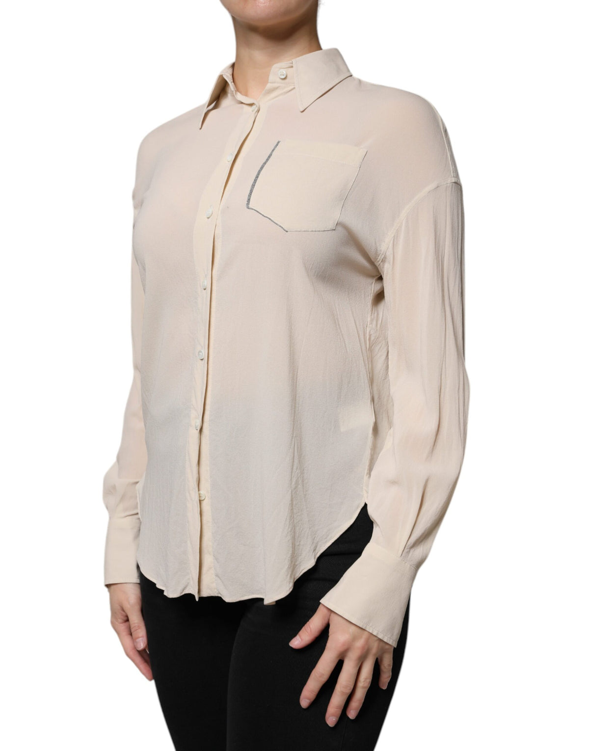 Indulge in the exquisite Brunello Cucinelli Beige Silk Blend Collared Button Down Top, a timeless masterpiece of luxury and elegance, crafted for the discerning individual.
