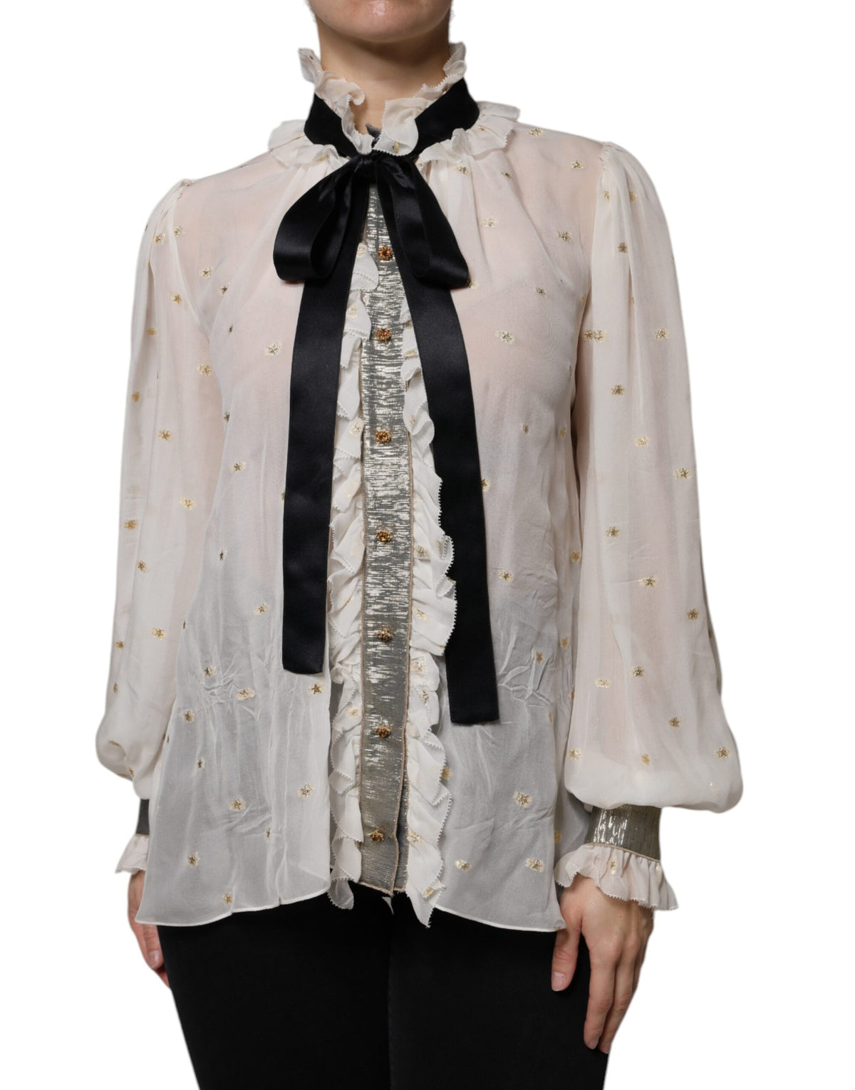 Experience the allure of the Dolce & Gabbana Off White Silk Blend Ascot Collar Blouse, a masterpiece of Italian craftsmanship that embodies timeless sophistication and refined elegance.