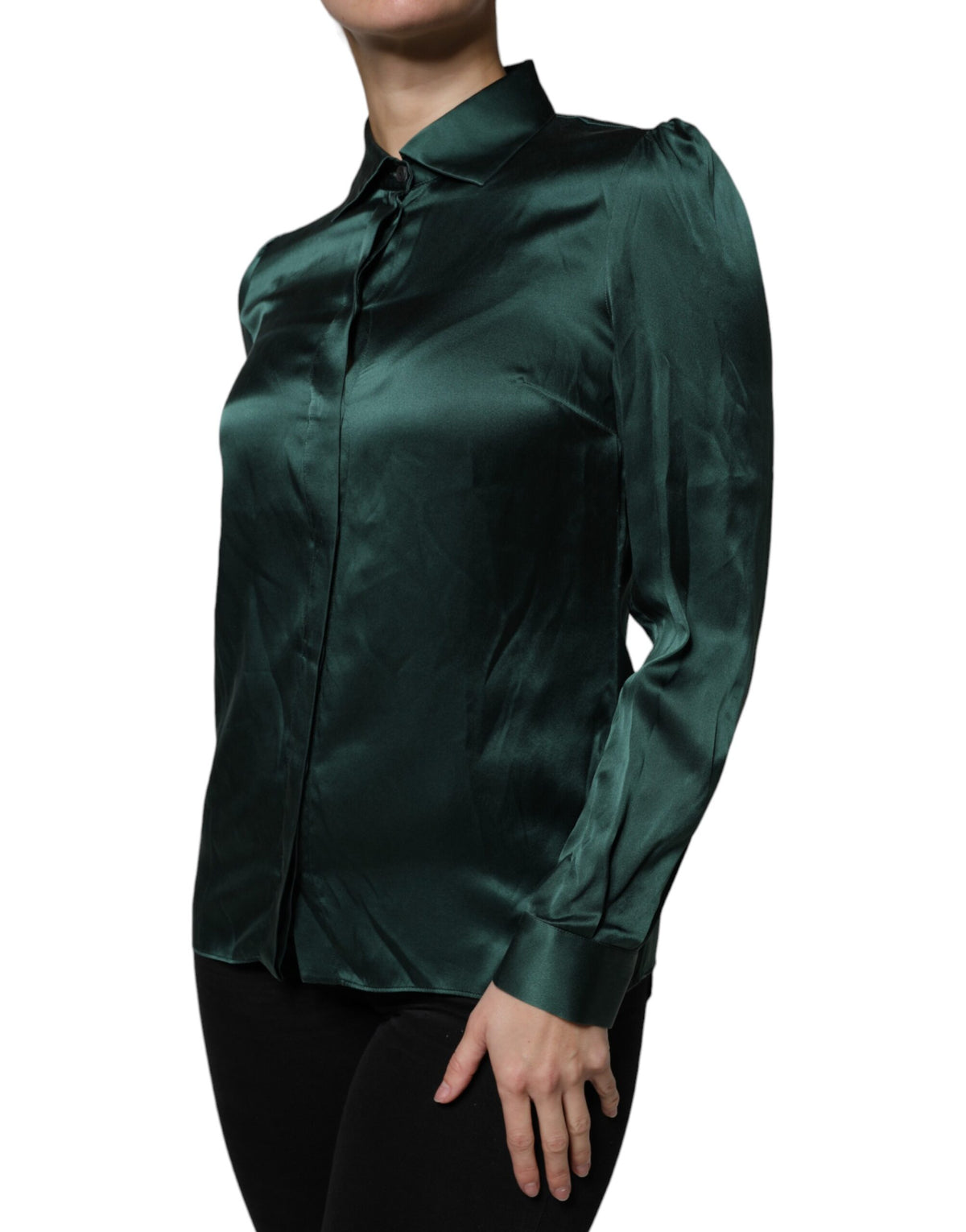 Experience the allure of the Dolce & Gabbana Dark Green Silk Button Down Blouse, a timeless piece that embodies exquisite craftsmanship and sophisticated elegance for the discerning individual.
