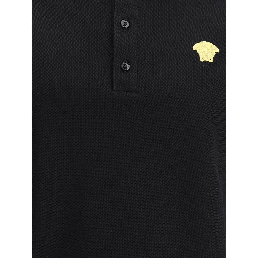 Discover the Versace Black Cotton Polo Shirt, a timeless blend of exquisite craftsmanship and luxurious comfort, perfect for the discerning individual.