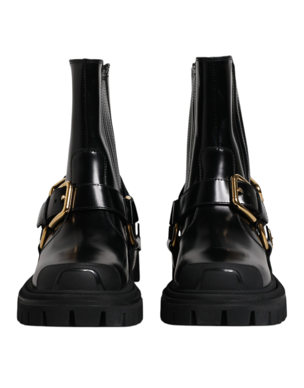 Step into the realm of luxury with Dolce & Gabbana's Black Leather Slip On Stretch Trekking Boots, handcrafted in Italy for those who embody elegance and sophistication.
