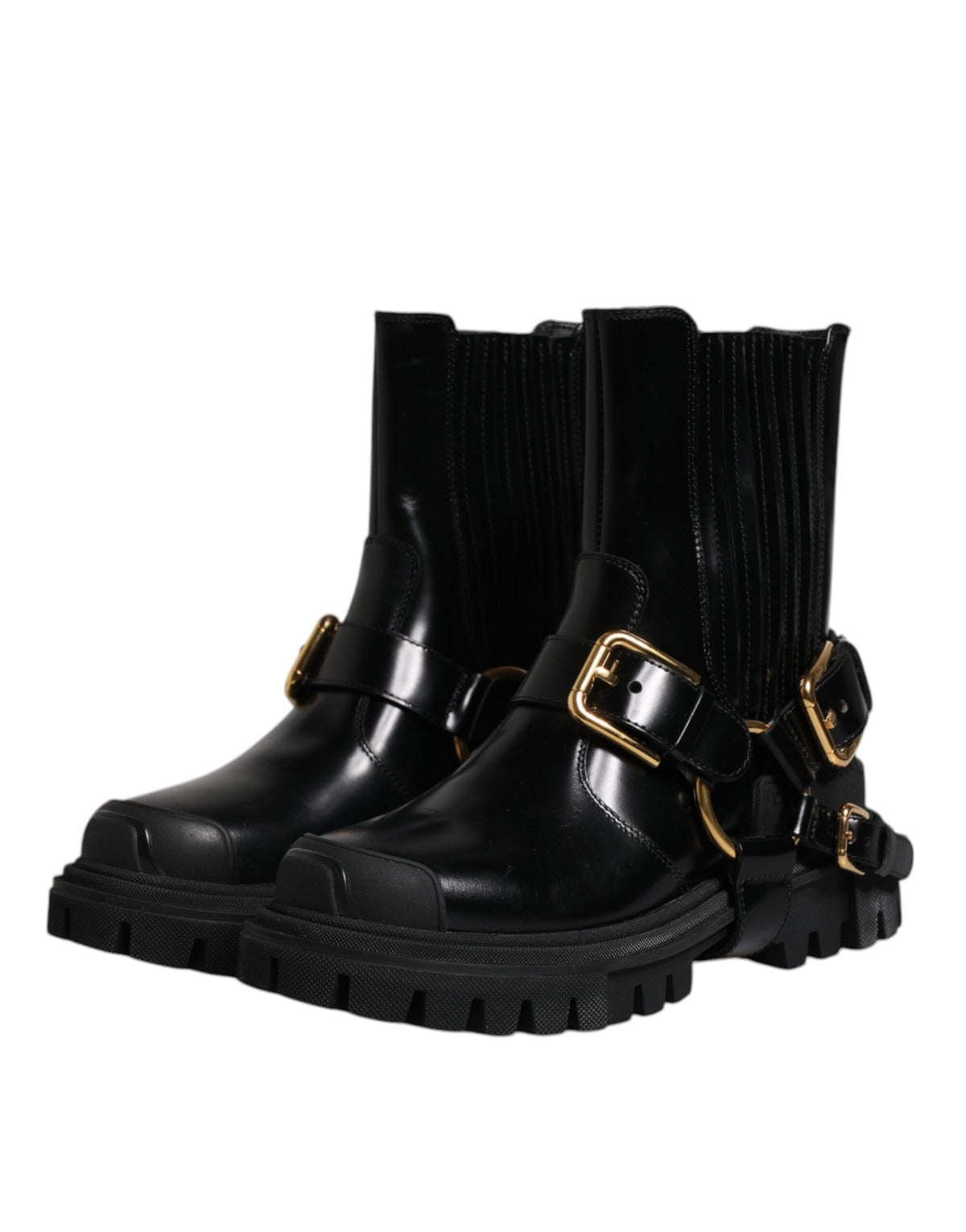 Experience the allure of Dolce & Gabbana's Black Leather Slip On Stretch Trekking Boots, where exquisite craftsmanship meets luxurious materials for timeless elegance.