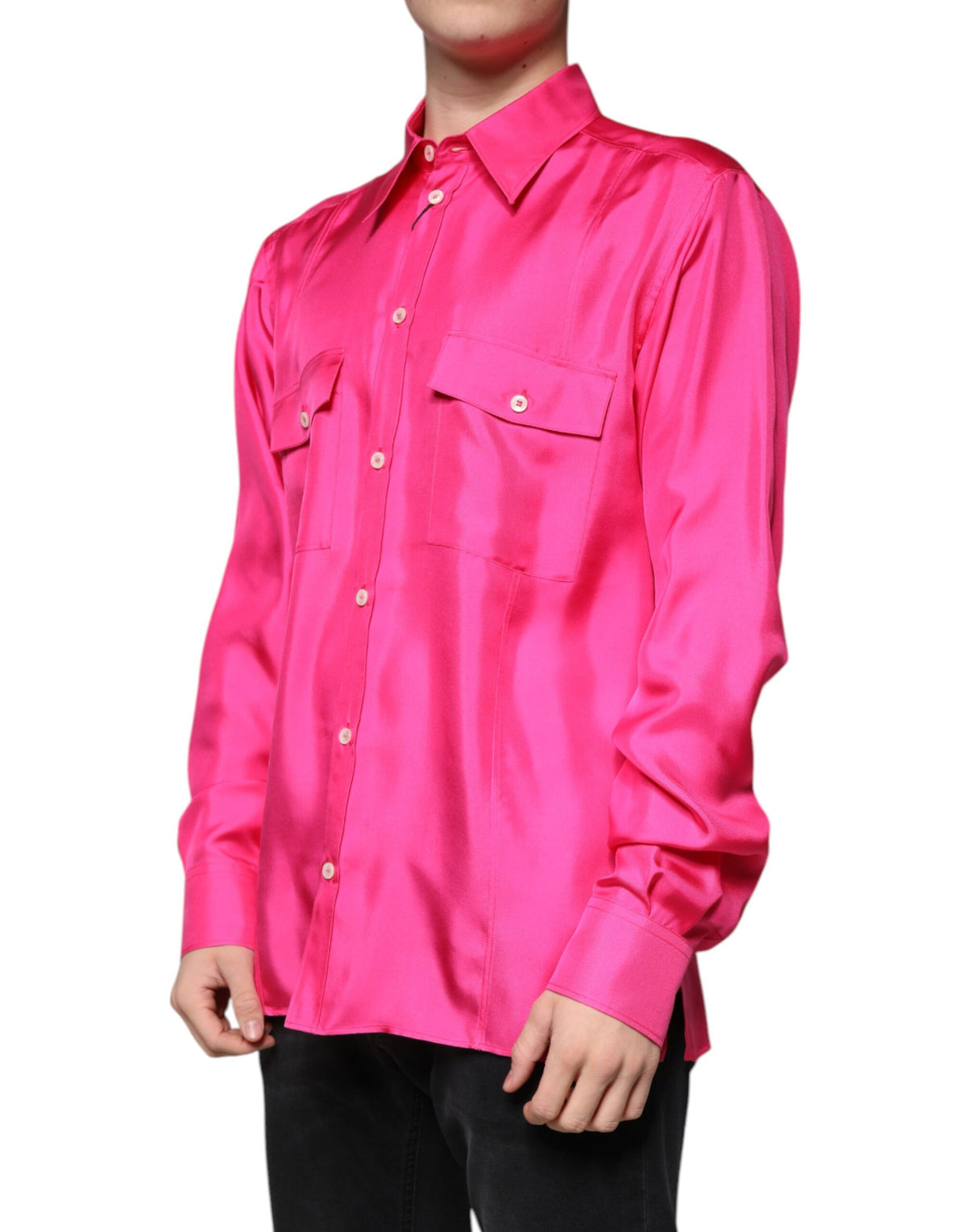 Elevate your wardrobe with the Dolce & Gabbana Pink Silk Collared Button Down Shirt, a masterpiece of Italian craftsmanship that embodies timeless elegance and sophisticated allure.