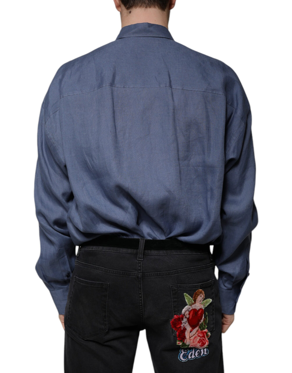Indulge in the Dolce & Gabbana Blue Logo Long Sleeve Button Down Shirt, a testament to Italian craftsmanship in luxurious 100% flax, embodying timeless elegance for the discerning individual.