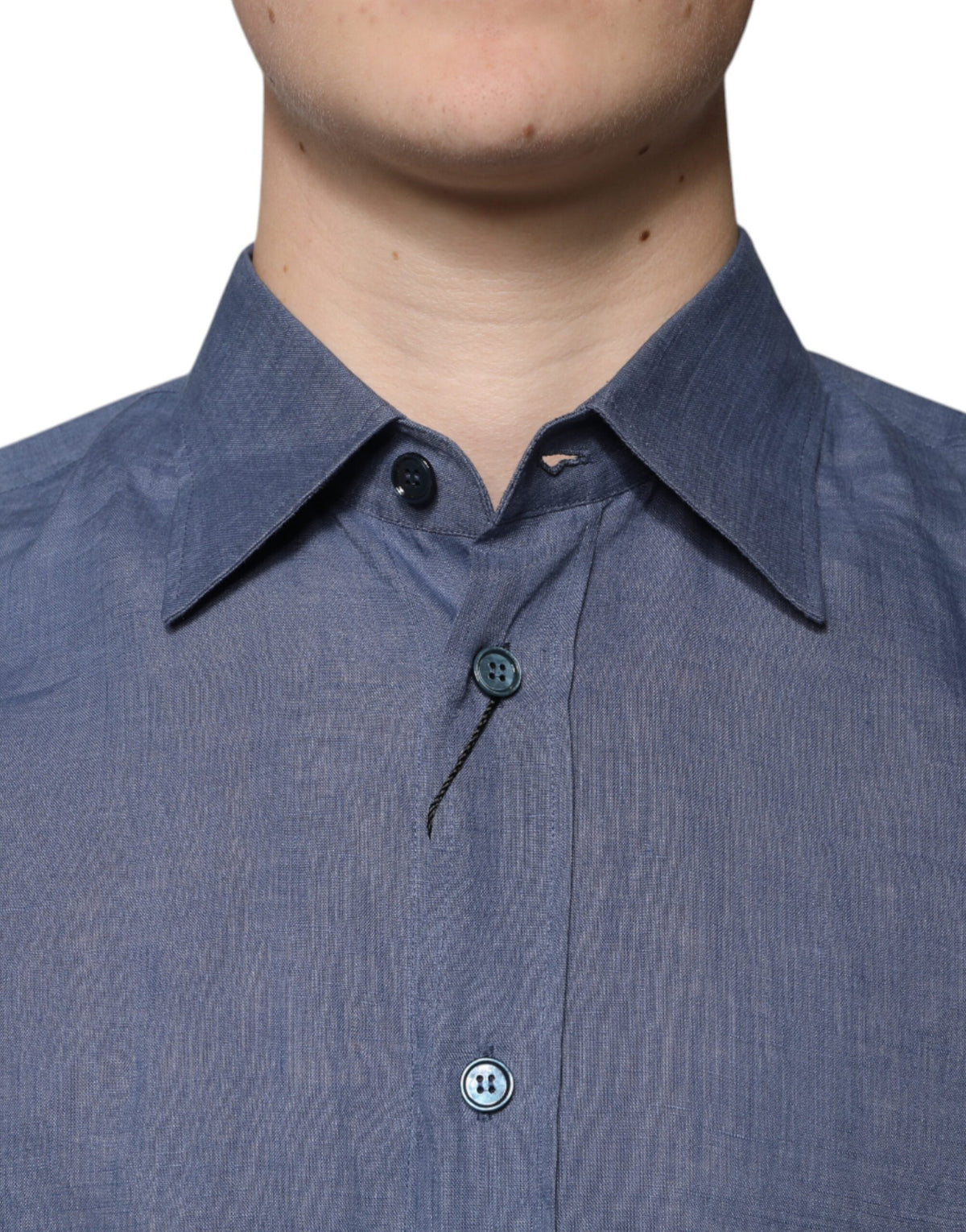Indulge in the Dolce & Gabbana Blue Logo Long Sleeve Button Down Shirt, crafted from luxurious 100% flax, embodying timeless elegance and sophisticated allure for the discerning individual.