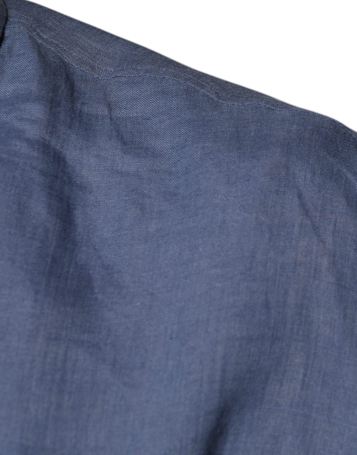 Experience the epitome of elegance with the Dolce & Gabbana Blue Logo Long Sleeve Button Down Shirt, crafted from luxurious 100% flax for timeless sophistication.