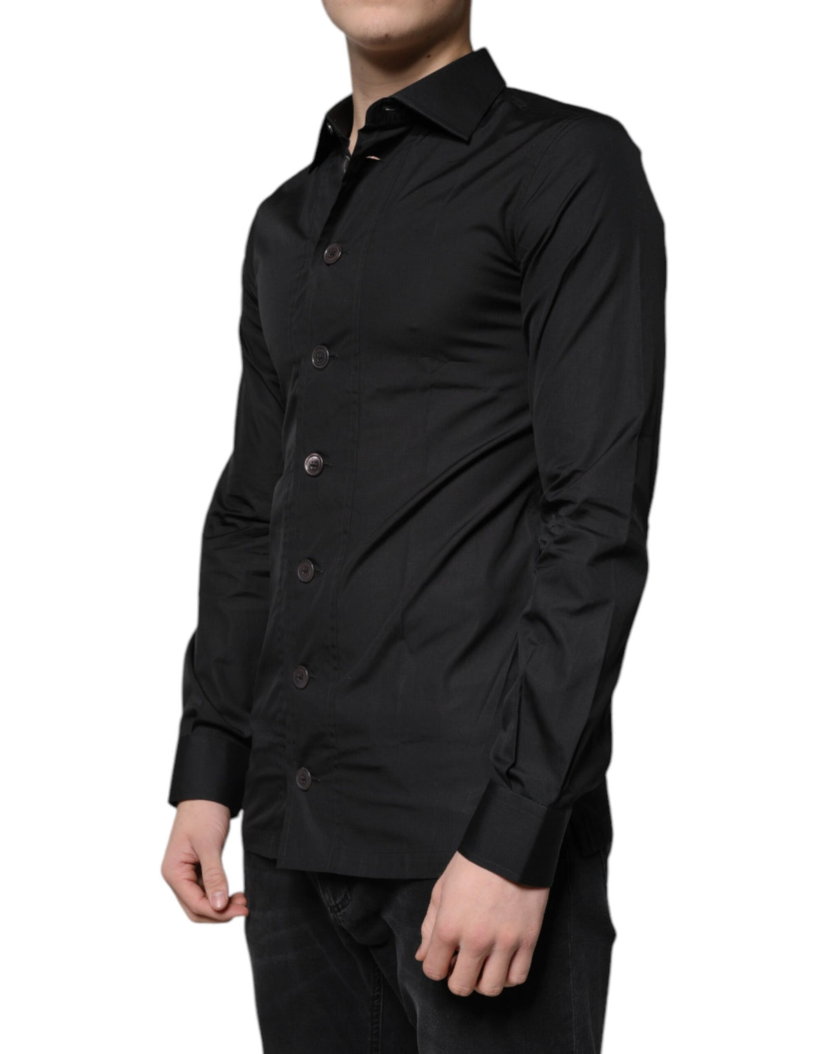 Elevate your wardrobe with the Dolce & Gabbana Black Cotton Formal Long Sleeves Dress Shirt, a masterpiece of exquisite craftsmanship and timeless elegance, perfect for any sophisticated occasion.