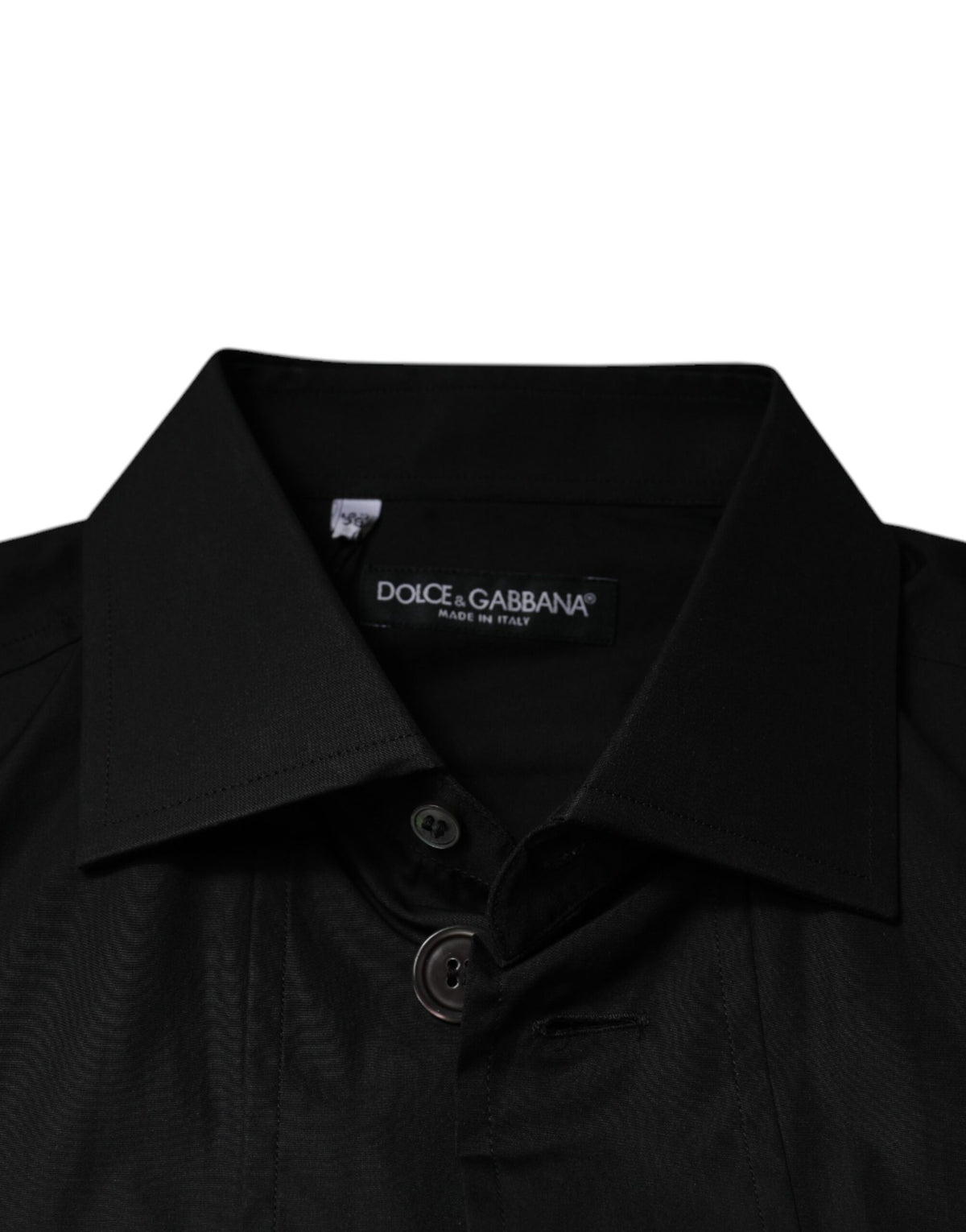 Indulge in the luxurious Dolce & Gabbana Black Cotton Formal Long Sleeves Dress Shirt, a timeless masterpiece of exquisite craftsmanship, perfect for elevating any sophisticated wardrobe.