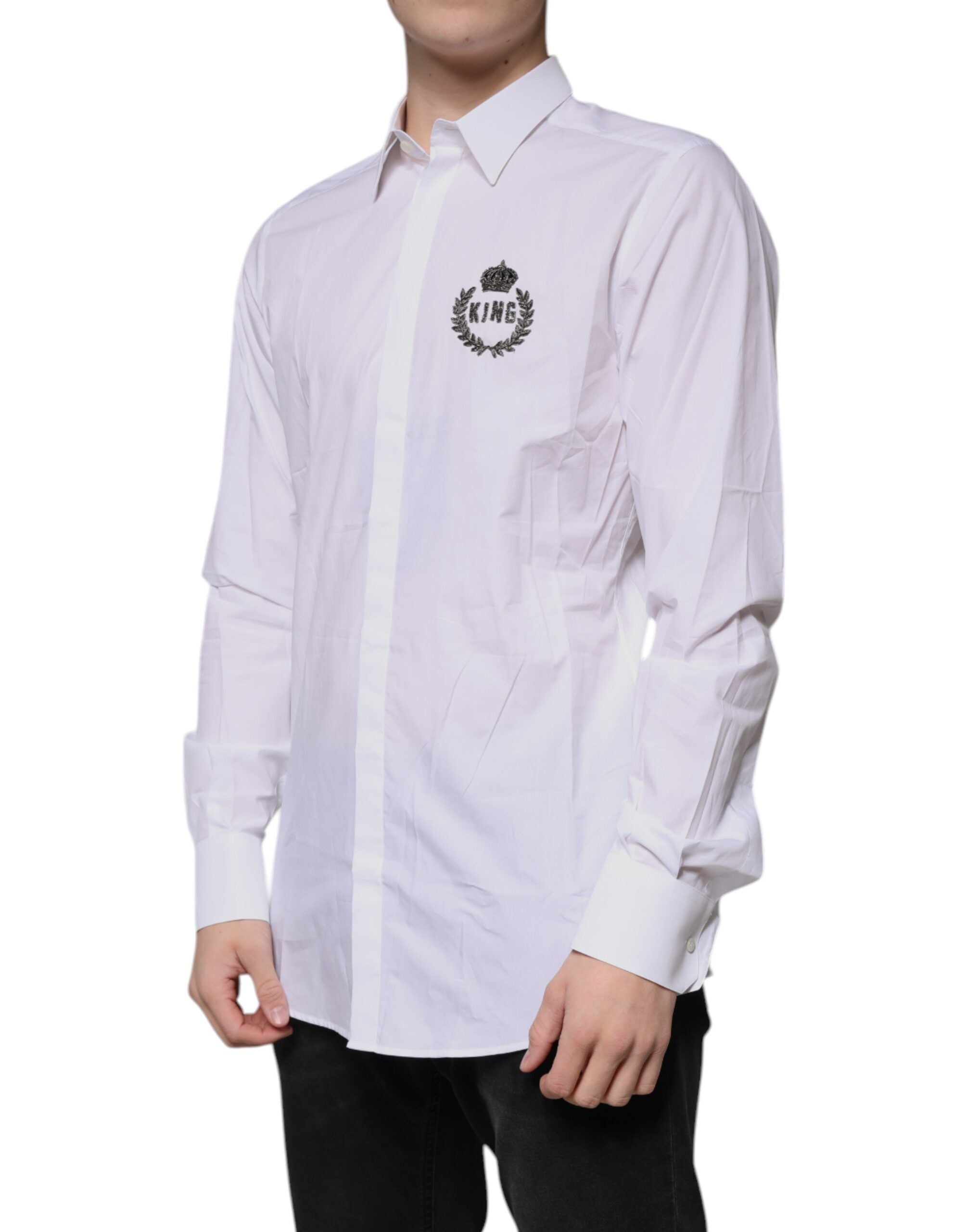 Elevate your wardrobe with the Dolce & Gabbana White Cotton Logo Dress Shirt, a masterpiece of Italian craftsmanship, perfect for the discerning individual who embodies elegance and sophistication.