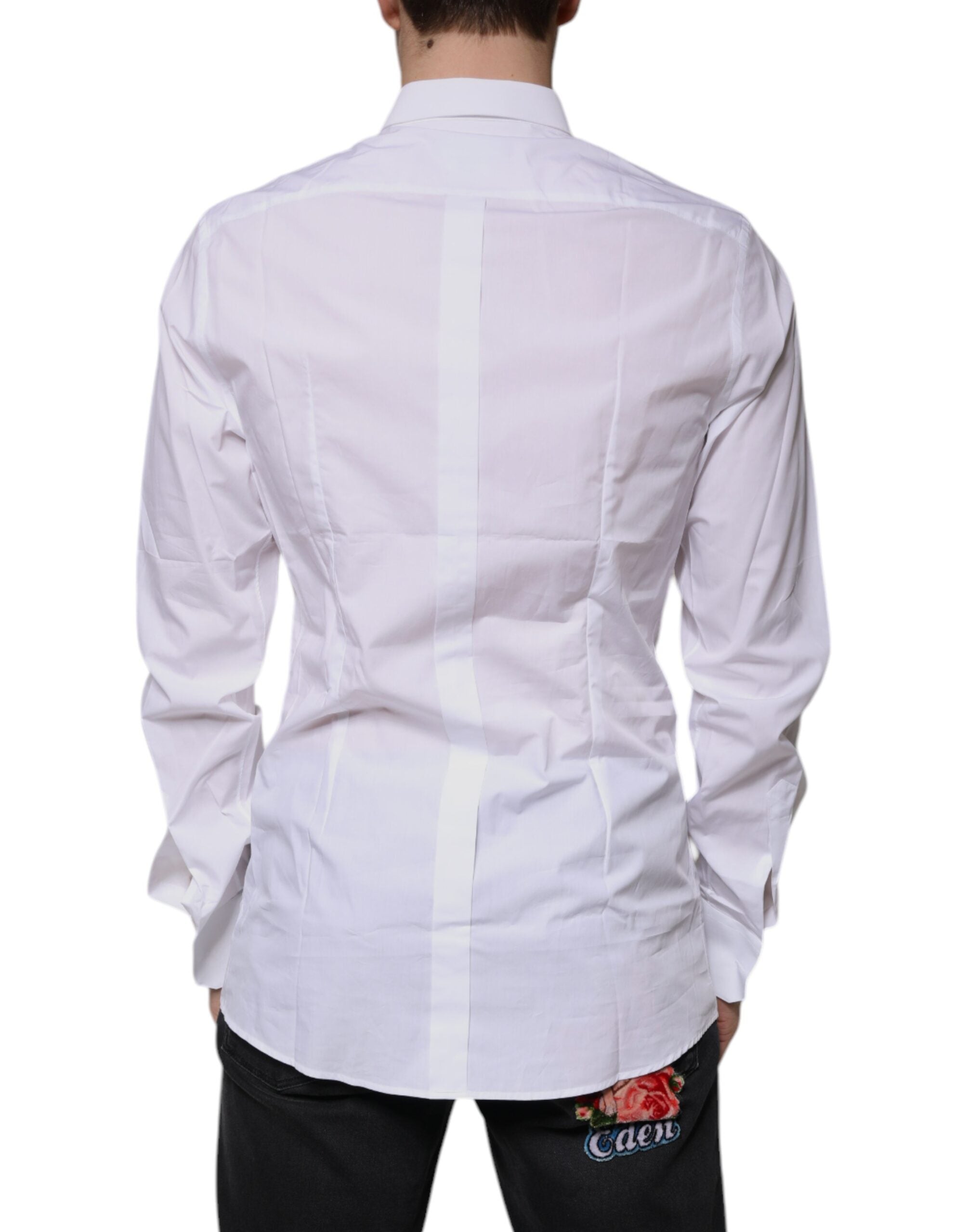Elevate your wardrobe with the Dolce & Gabbana White Cotton Logo Dress Shirt, a masterpiece of Italian craftsmanship that embodies luxury and sophistication.