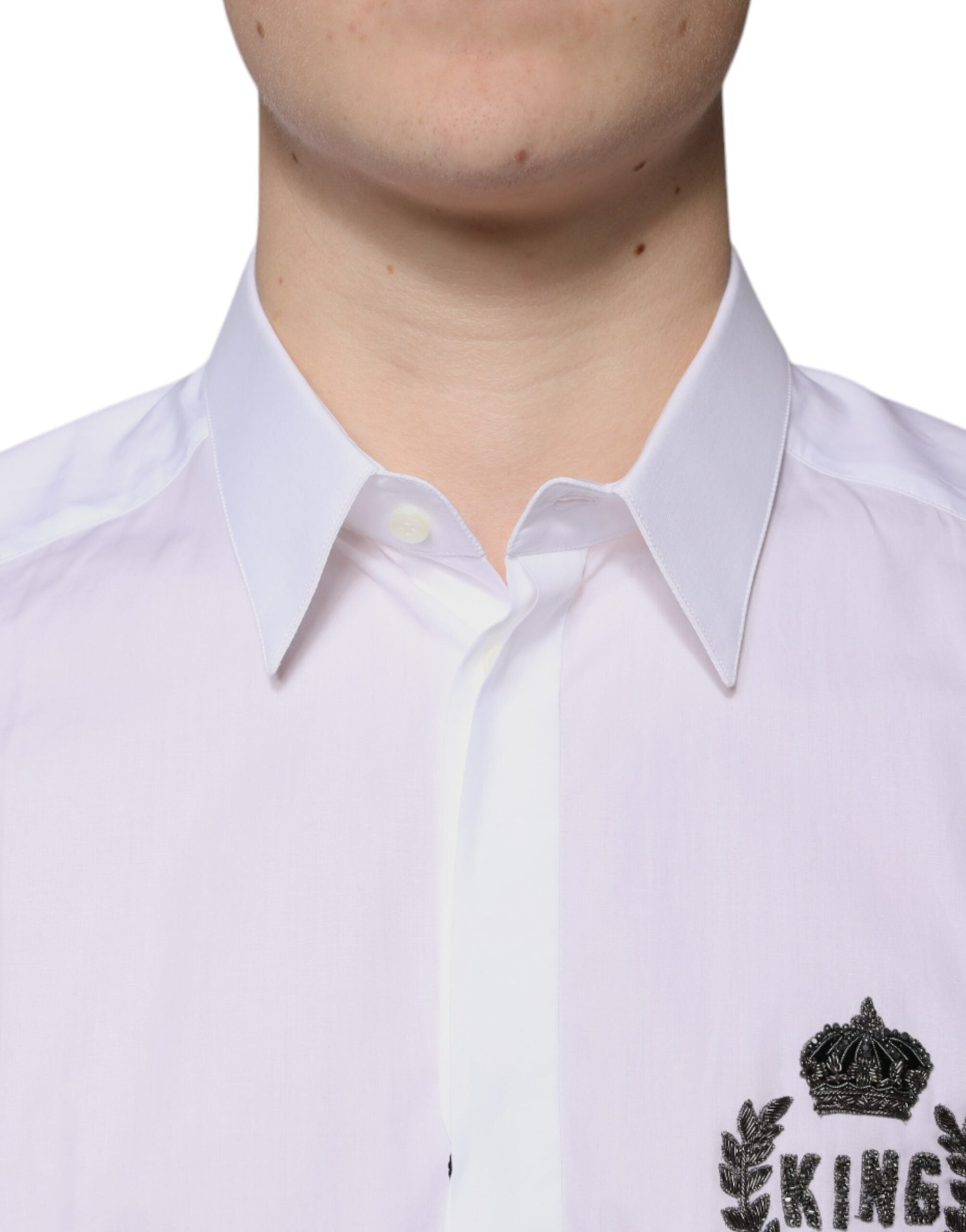 Elevate your wardrobe with the Dolce & Gabbana White Cotton Logo Dress Shirt, a masterpiece of Italian craftsmanship that embodies luxury and refined elegance.