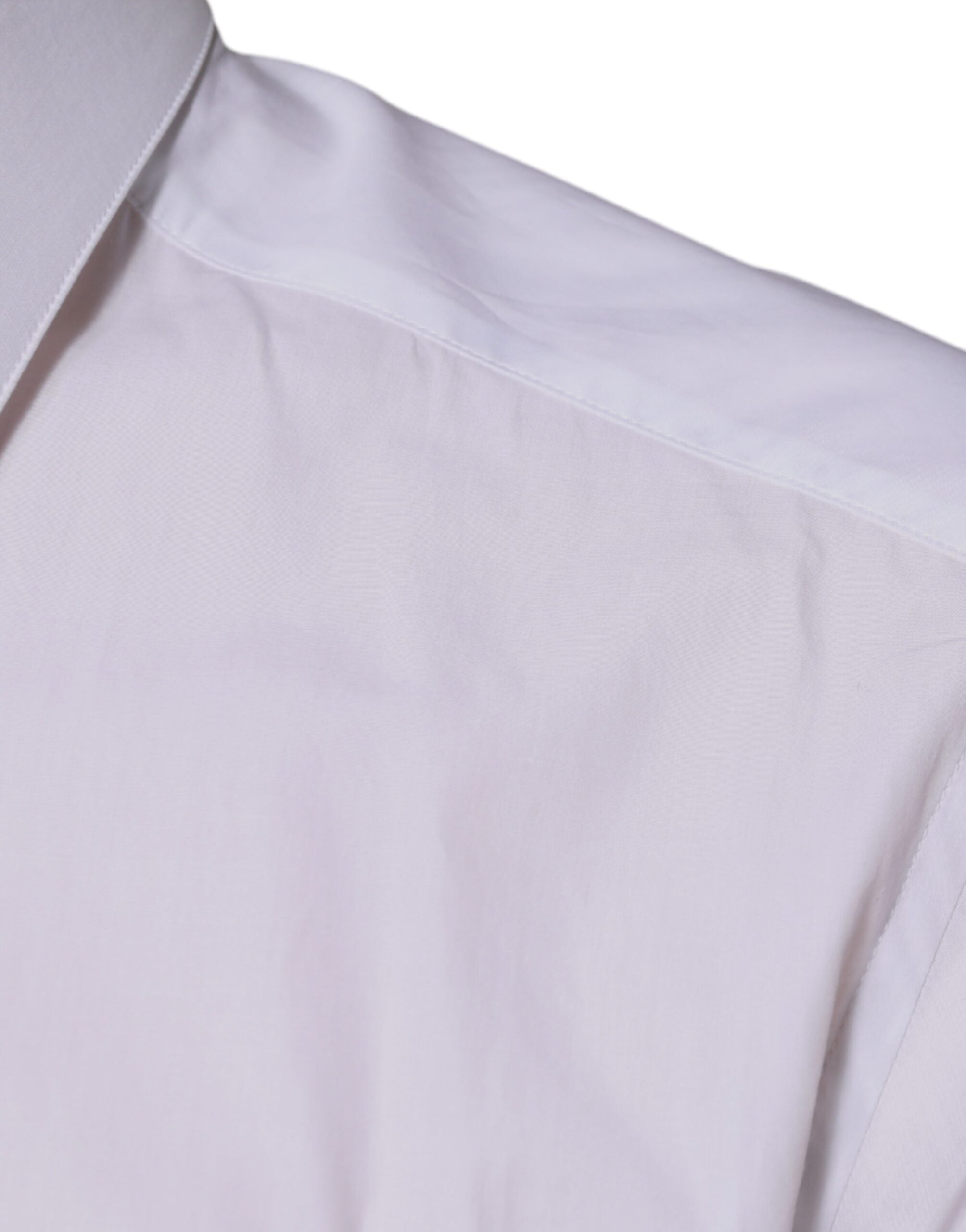 Elevate your wardrobe with the Dolce & Gabbana White Cotton Logo Formal Dress Shirt, a masterpiece of Italian craftsmanship, embodying luxury and sophistication for the discerning individual.