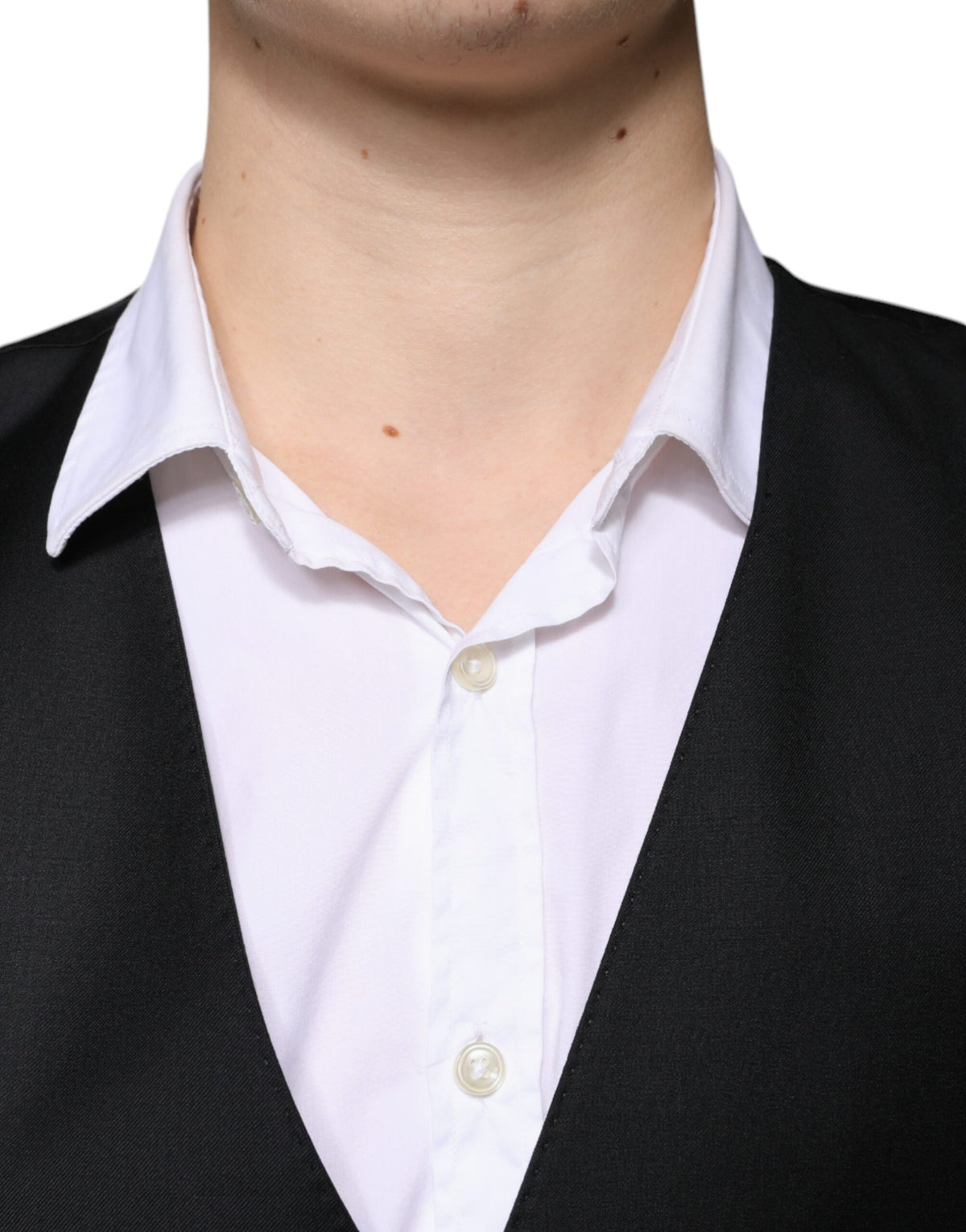 Elevate your elegance with the Dolce & Gabbana Black Wool Formal Dress Waistcoat, a luxurious blend of virgin wool and silk, embodying timeless sophistication and impeccable craftsmanship.