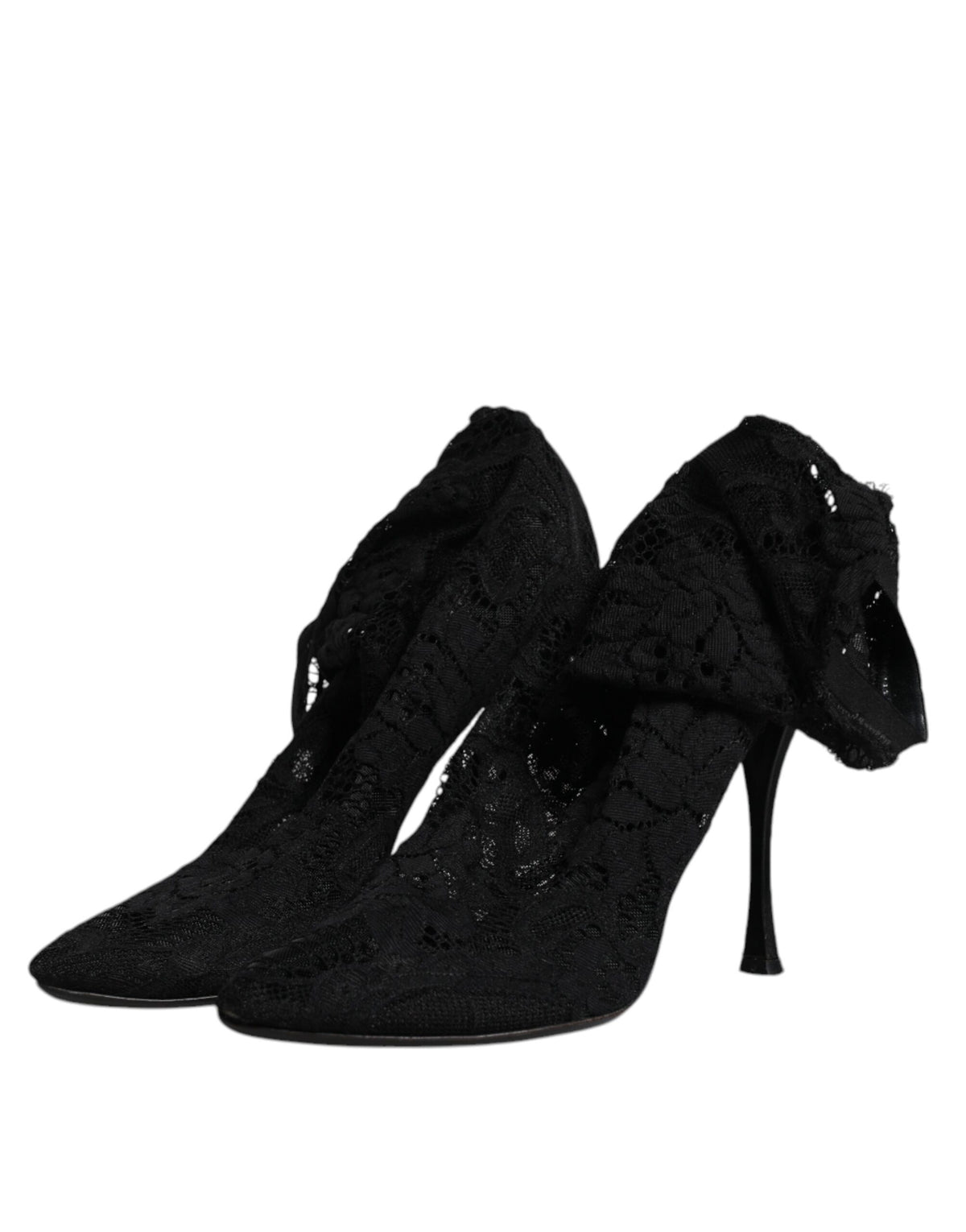 Step into the realm of elegance with Dolce & Gabbana's Black Lace Stretch Heels, where exquisite craftsmanship meets timeless allure for the discerning individual.