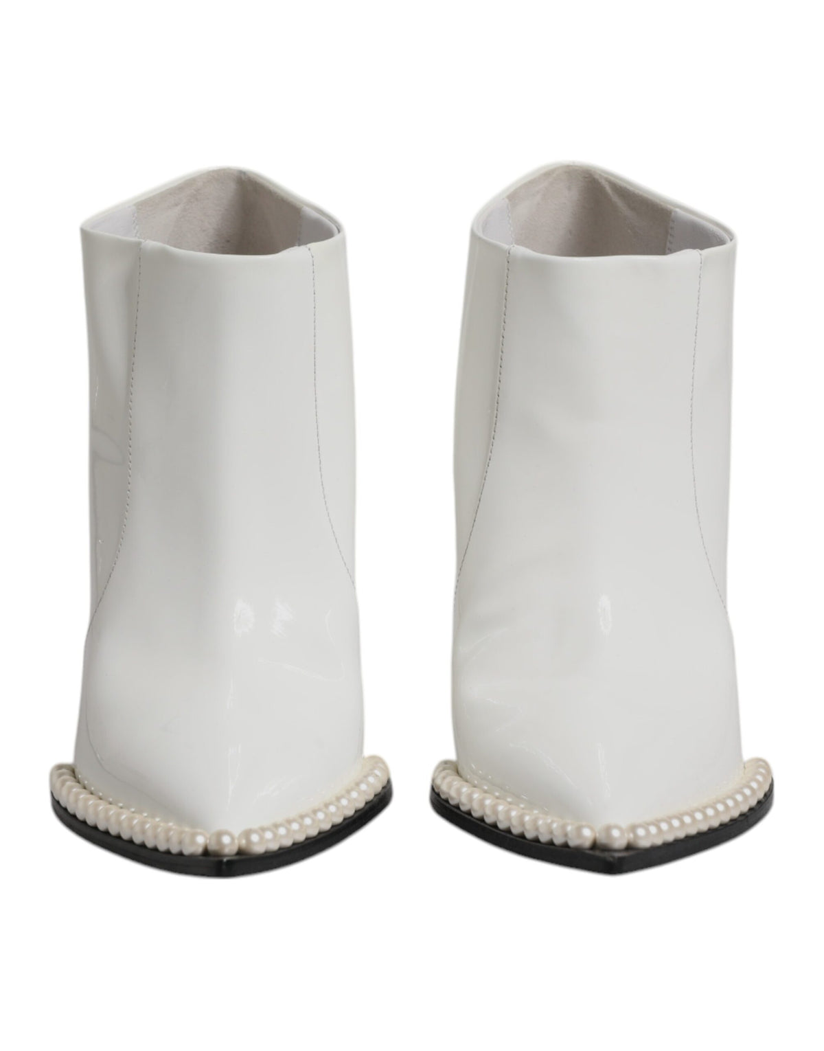 Step into a world of elegance with Dolce & Gabbana's White Faux Pearl Leather Ankle Boots, crafted from premium calf leather for timeless sophistication and allure.