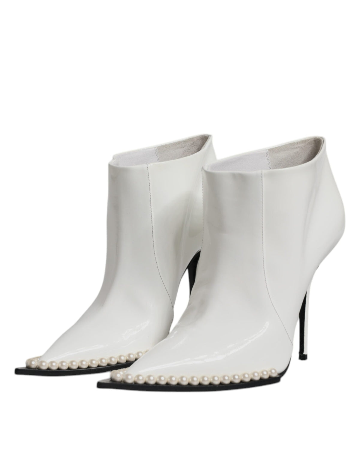Step into a world of elegance with Dolce & Gabbana's White Faux Pearl Leather Ankle Boots, crafted from premium calf leather for timeless sophistication and allure.