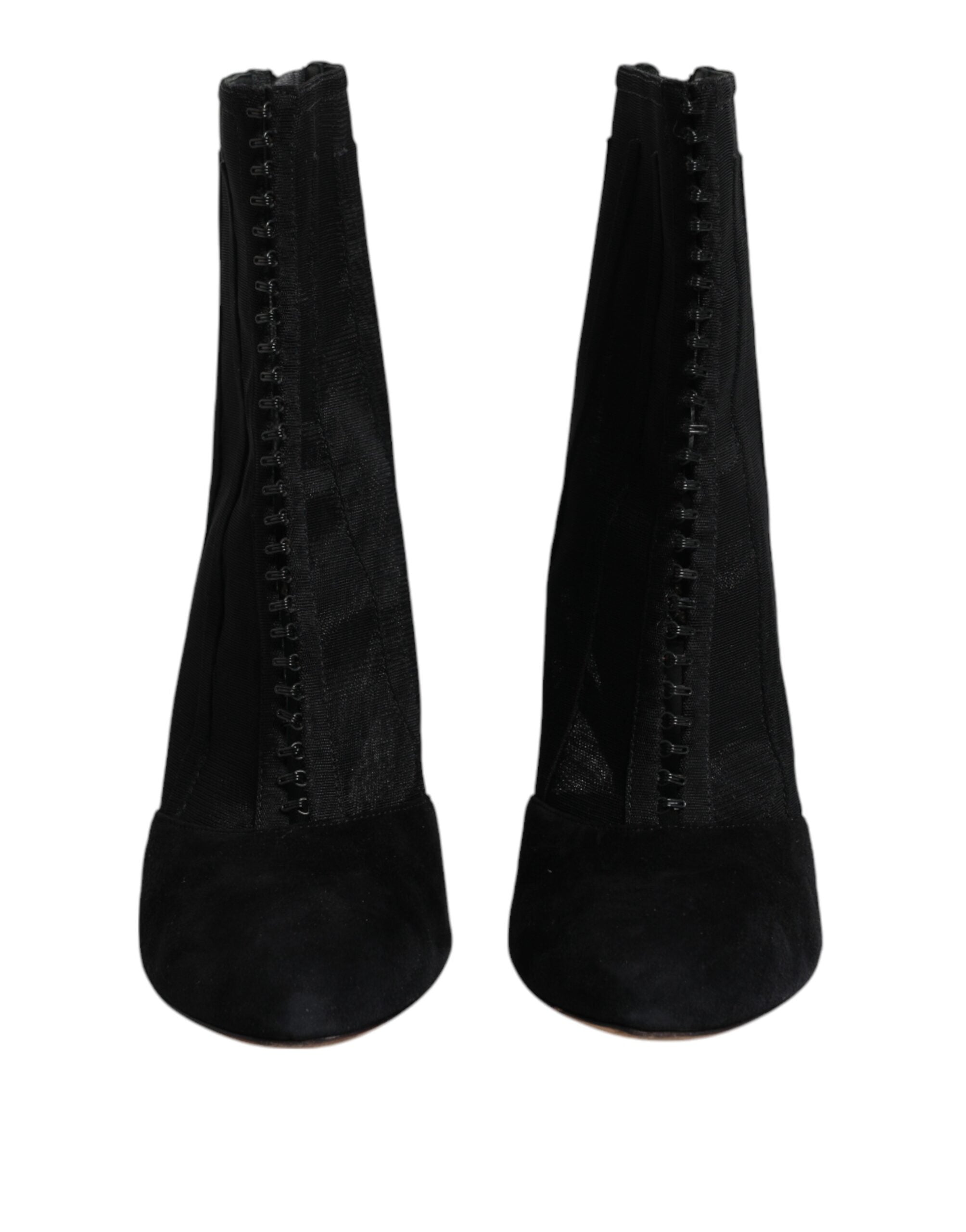 Indulge in the allure of Dolce & Gabbana's Black Mesh Stiletto Heels Ankle Boots, where exquisite Italian craftsmanship meets luxurious comfort for the discerning individual.