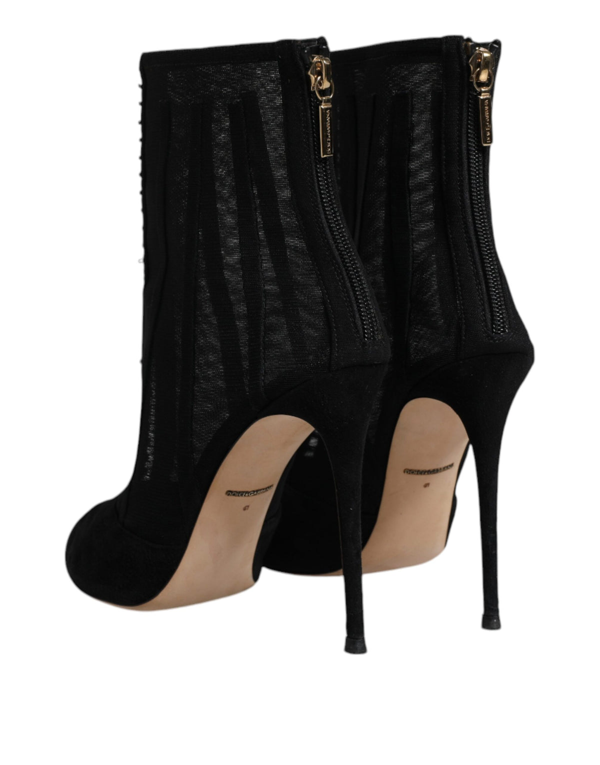 Indulge in the exquisite allure of Dolce & Gabbana's Black Mesh Stiletto Heels Ankle Boots, where Italian craftsmanship meets luxurious design, elevating every occasion.