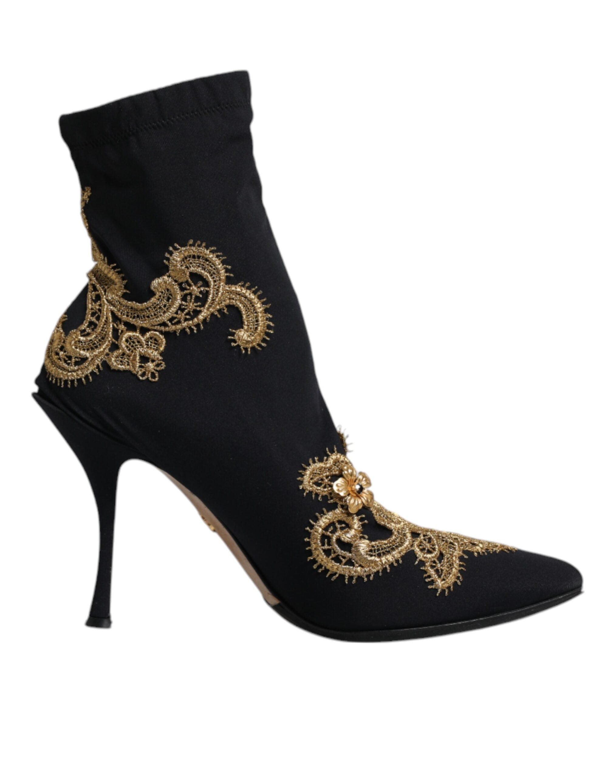 Indulge in the exquisite allure of Dolce & Gabbana Black Gold Embroidery Slip On Boots, where Italian craftsmanship meets luxurious comfort, elevating your style with timeless elegance.