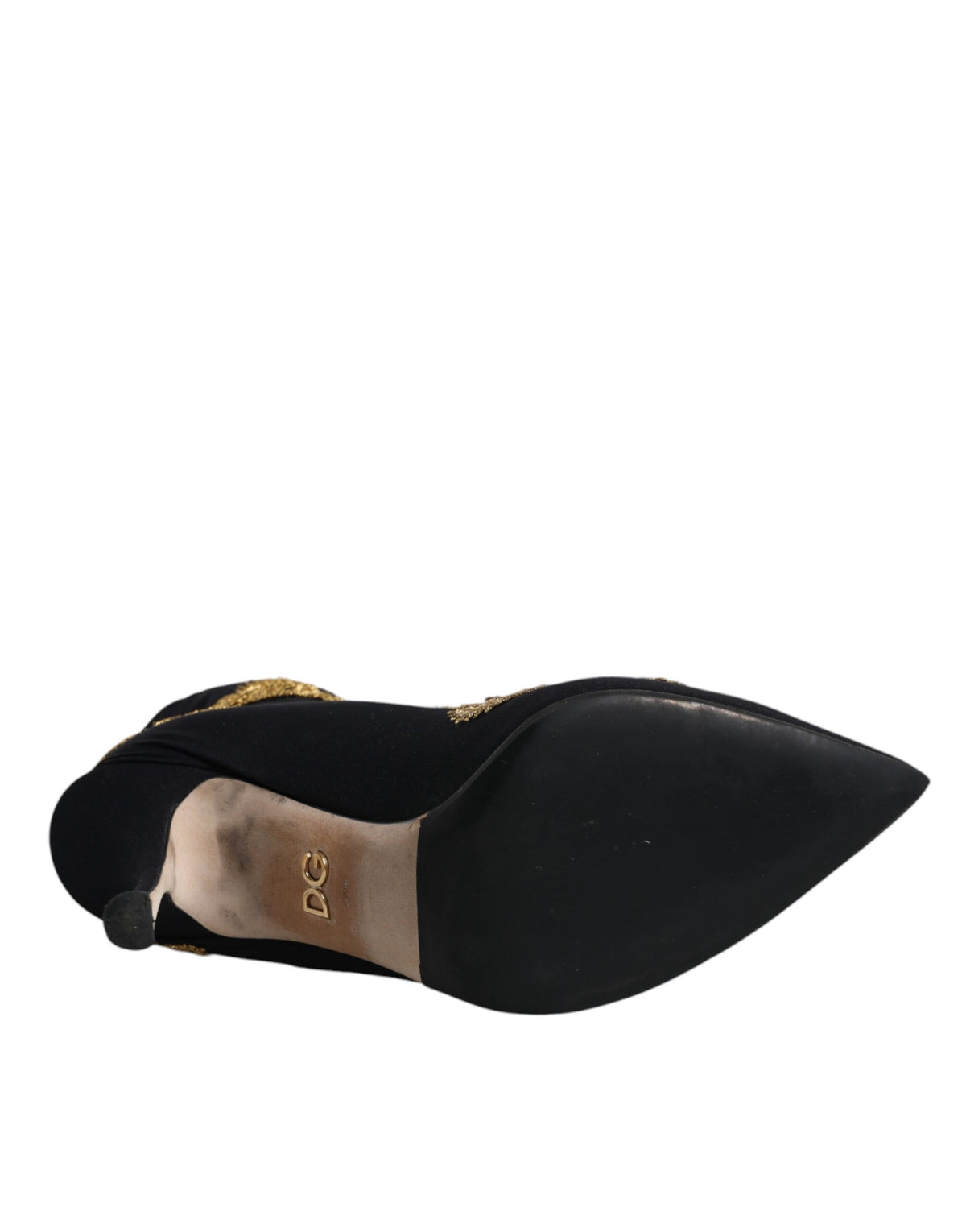 Indulge in the exquisite Dolce & Gabbana Black Gold Embroidery Slip On Boots, where Italian craftsmanship meets luxurious comfort, perfect for the discerning fashion lover.