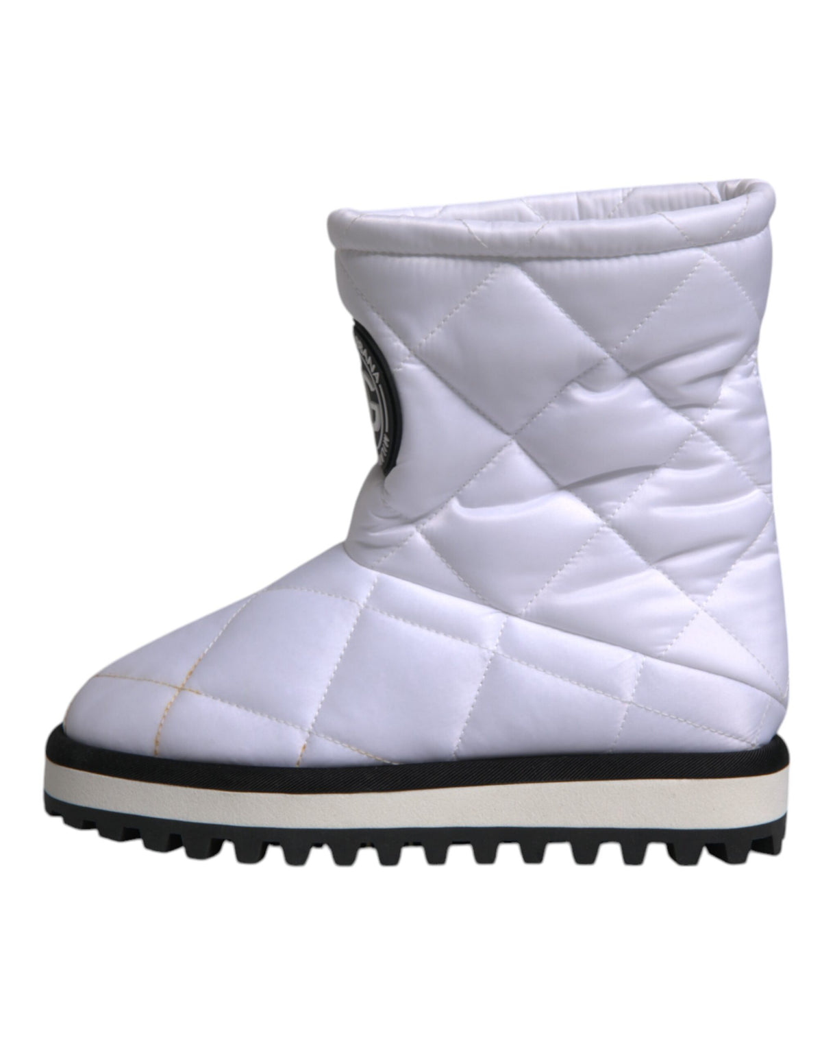 Indulge in the exquisite allure of Dolce & Gabbana's White Viscose Padded Mid Calf Boots, where Italian craftsmanship meets modern elegance for the discerning individual.