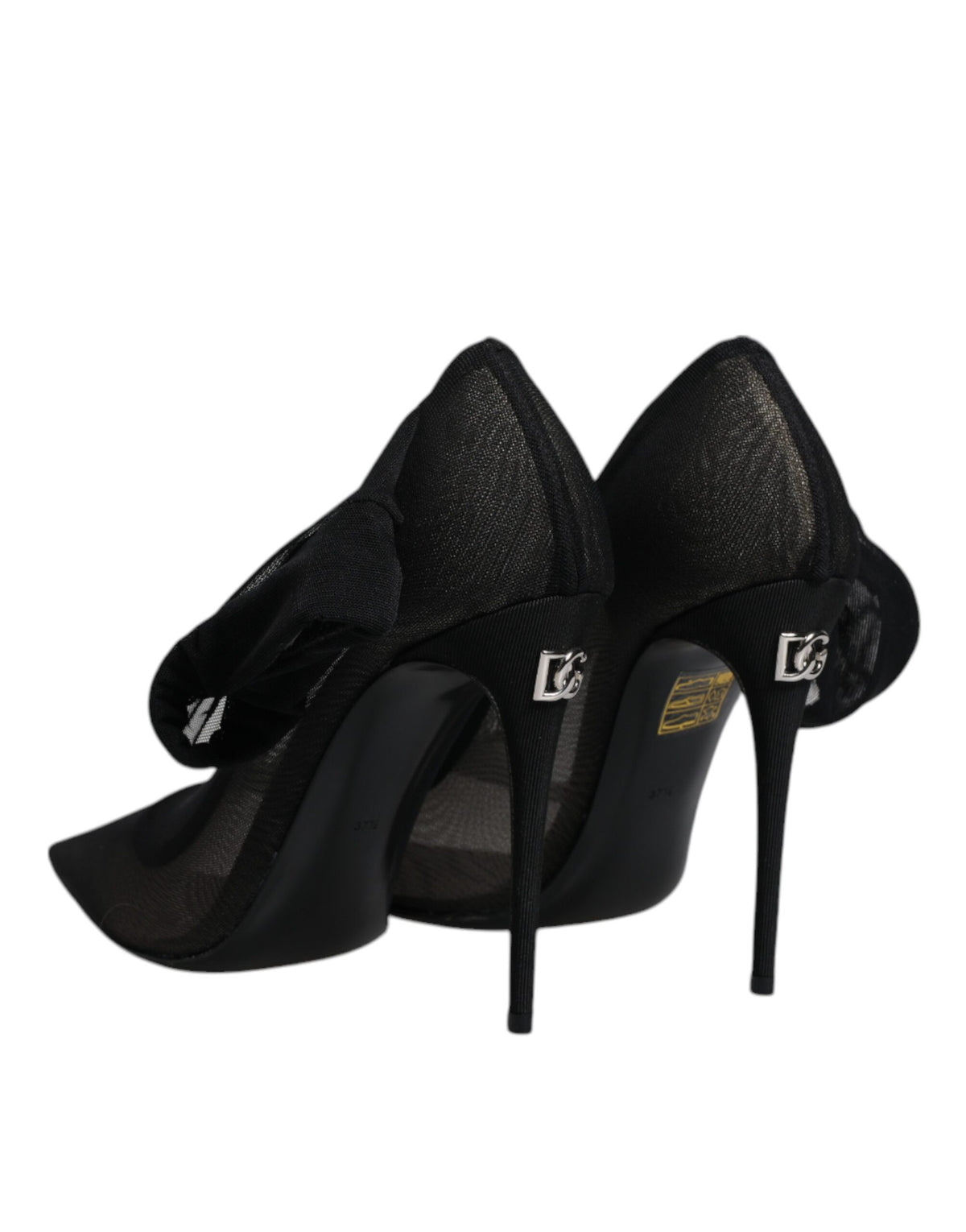 Indulge in the exquisite craftsmanship of Dolce & Gabbana's Black Viscose Mesh Sock Style Boots, where silk and viscose blend for unparalleled elegance and comfort.