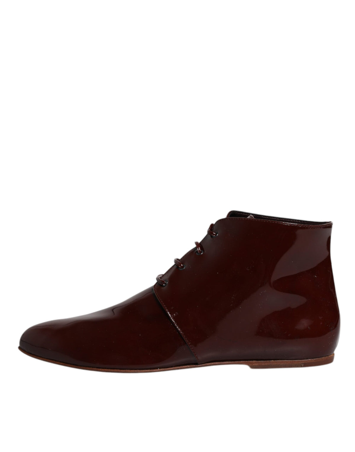 Discover the allure of Dolce & Gabbana's Maroon Leather Lace Up Ankle Boots, where exquisite Italian craftsmanship meets timeless elegance, perfect for the discerning individual.