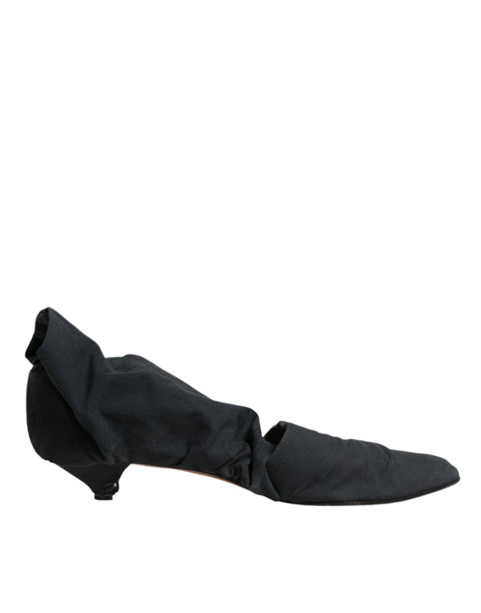 Indulge in the opulence of Dolce & Gabbana Green Cotton Sock Style Ankle Boots, where exquisite Italian craftsmanship meets luxurious comfort for the discerning connoisseur.