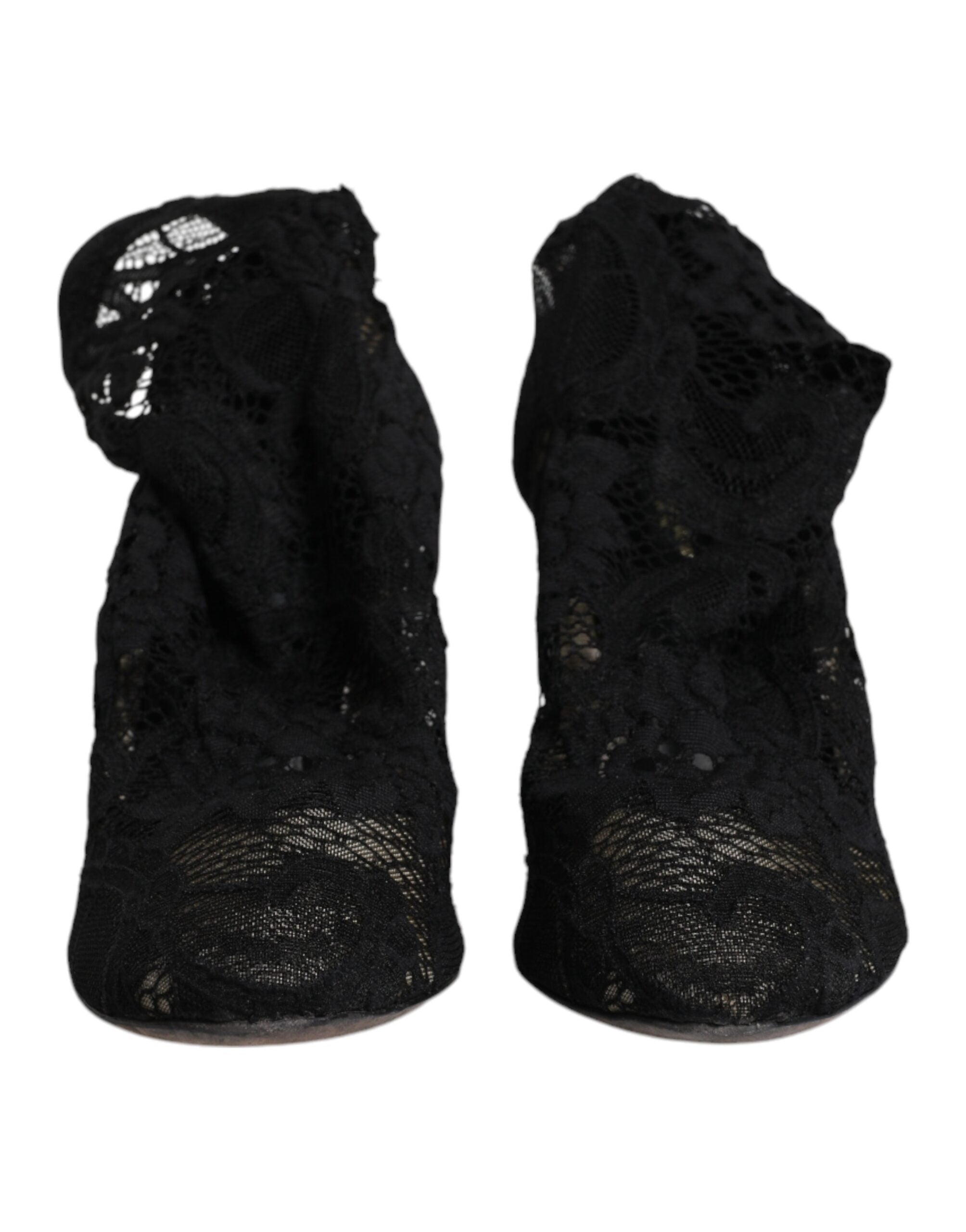 Indulge in the allure of Dolce & Gabbana's Black Lace Stretch Heels, where exquisite craftsmanship meets seductive elegance, perfect for the discerning fashion connoisseur.