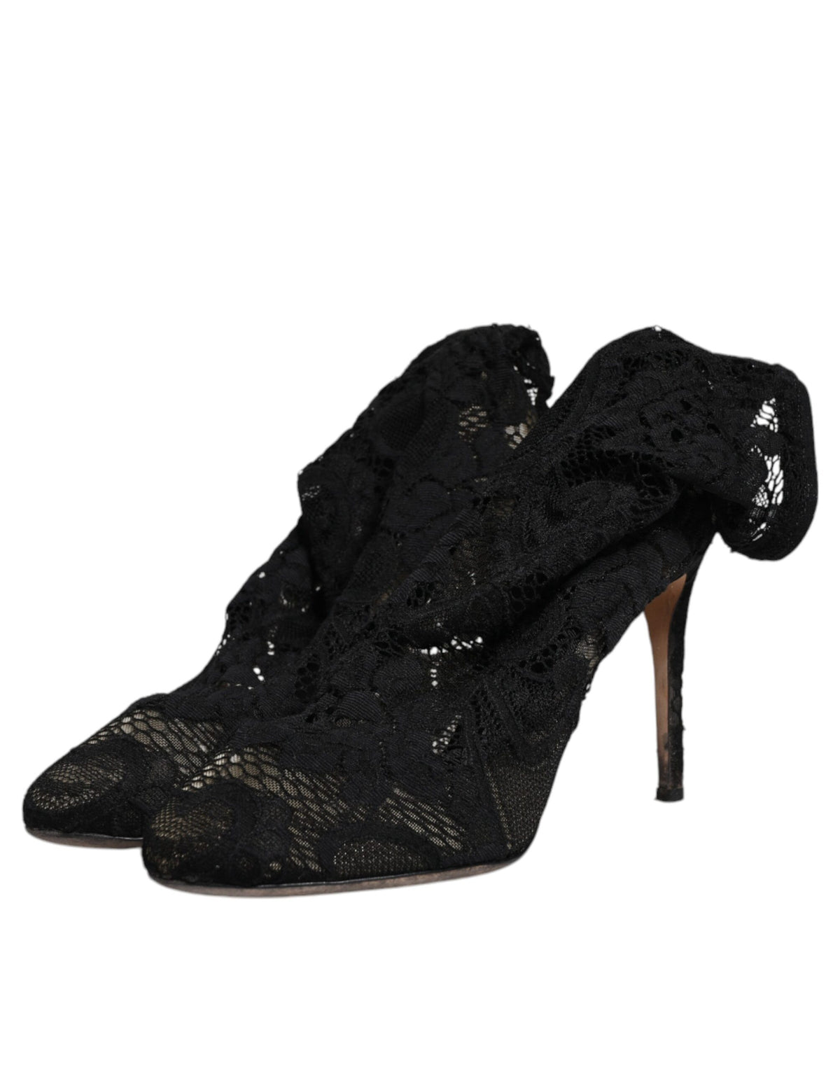 Step into refined elegance with Dolce & Gabbana's Black Lace Stretch Heels, crafted from luxurious materials for a captivating silhouette that enchants and elevates your style.