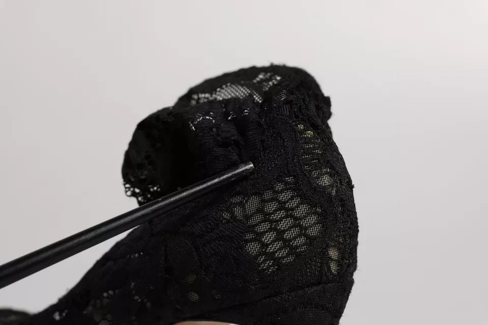 Indulge in the exquisite allure of Dolce & Gabbana's Black Lace Stretch Heels, where luxurious craftsmanship meets sensual elegance for the discerning fashion connoisseur.