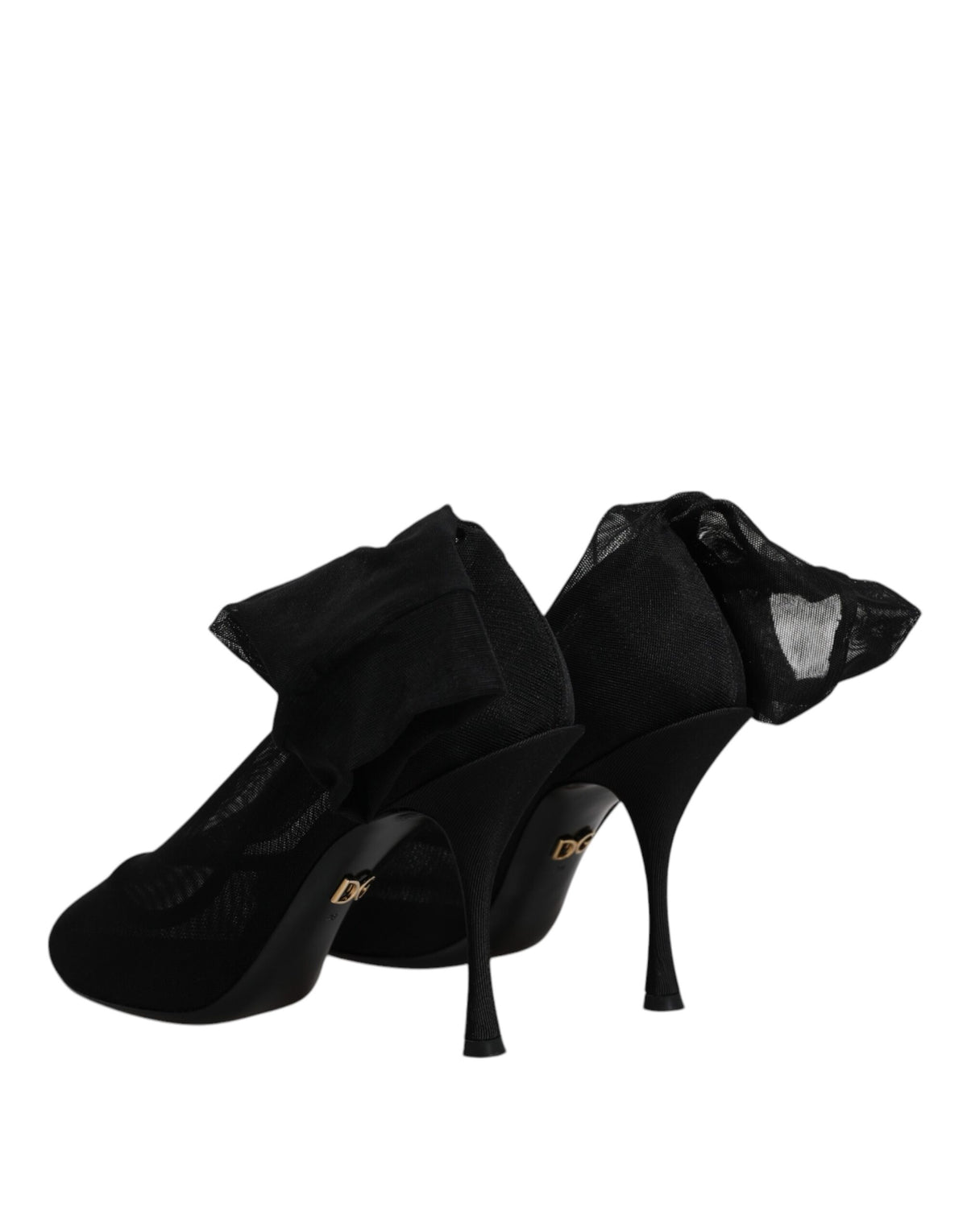 Discover the allure of Dolce & Gabbana's Black Silk Mesh Sock Style Boots, a masterpiece of Italian craftsmanship that embodies luxury, elegance, and timeless sophistication.