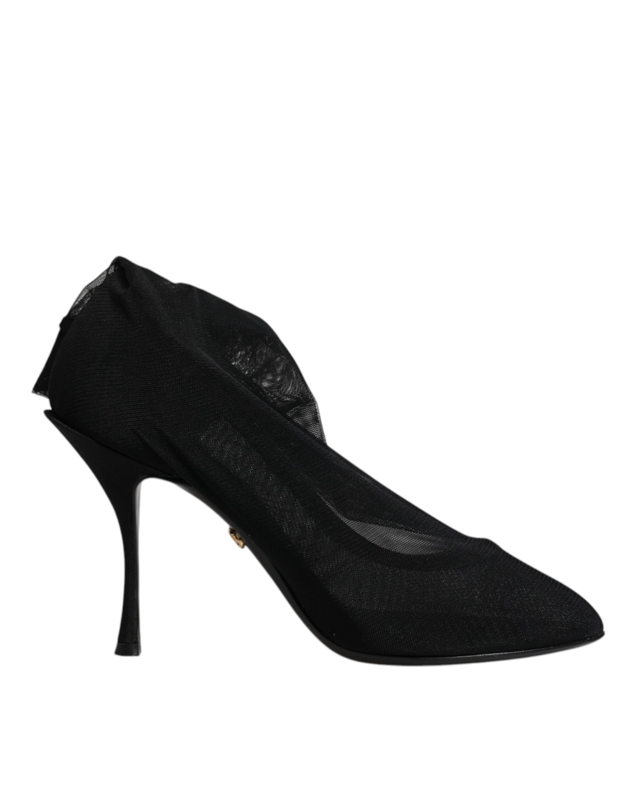 Indulge in the exquisite allure of Dolce & Gabbana's Black Silk Mesh Sock Style Boots, where luxurious Italian craftsmanship meets timeless elegance for the discerning connoisseur.