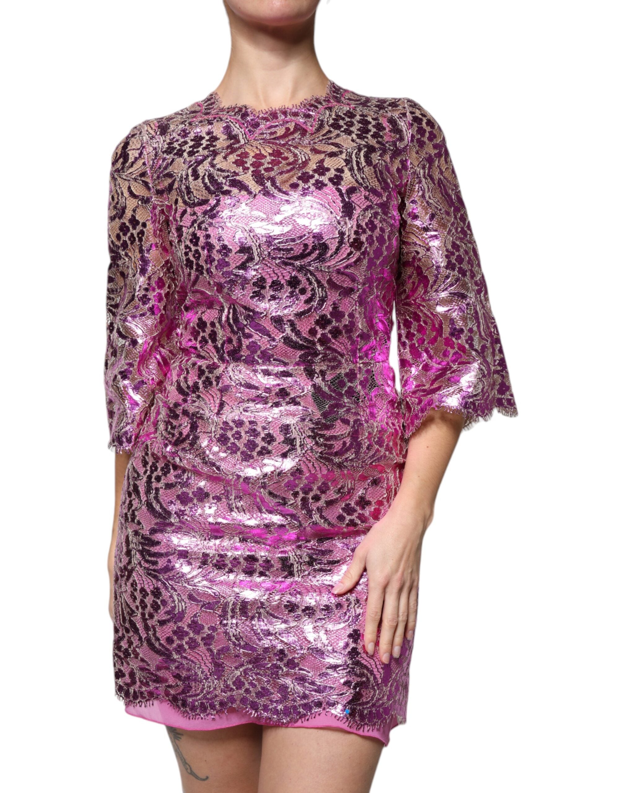 Elevate your wardrobe with the Dolce & Gabbana Metallic Fuchsia Floral Sheath Mini Dress, a masterpiece of Italian craftsmanship that embodies luxury and timeless elegance.