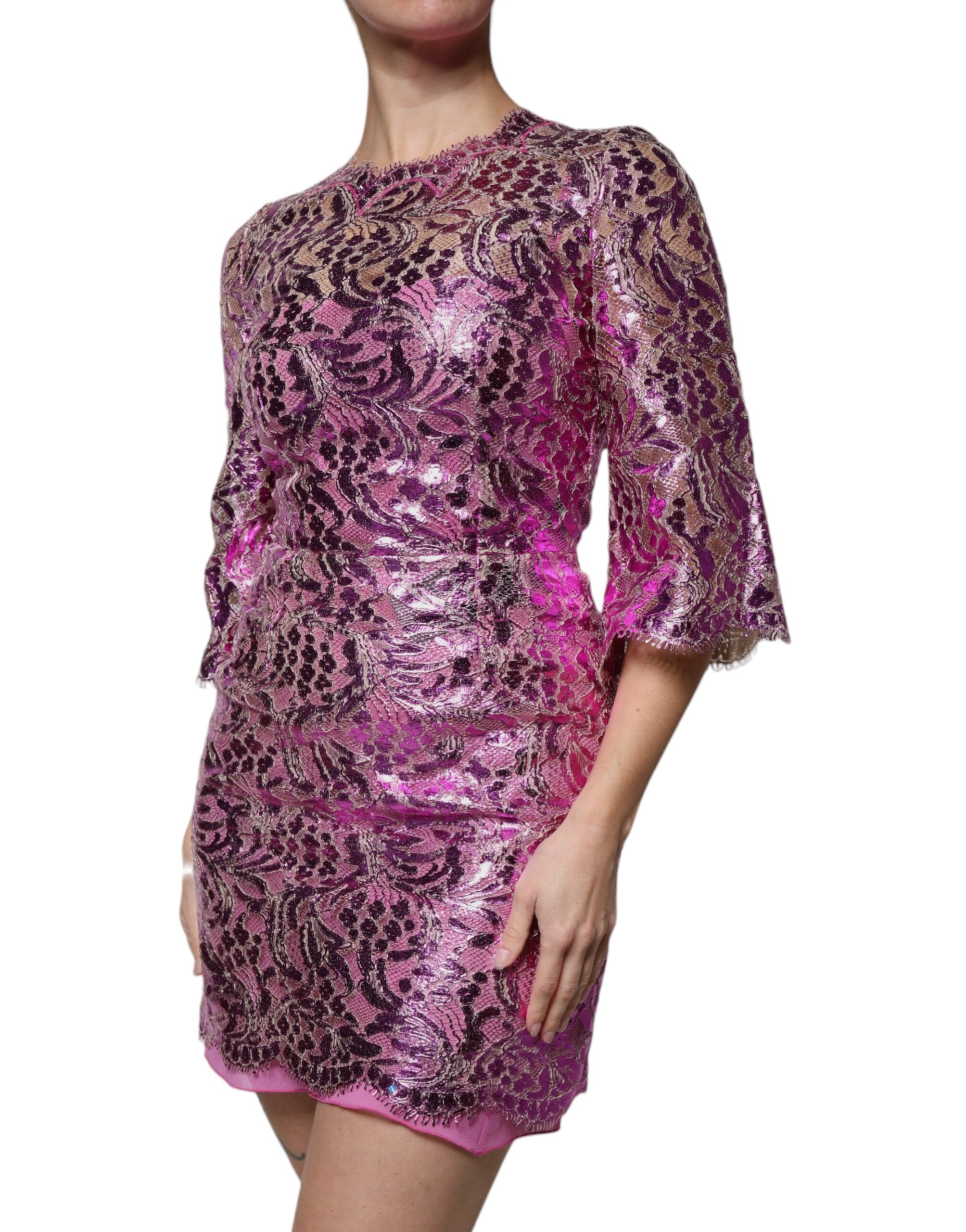 Elevate your wardrobe with the Dolce & Gabbana Metallic Fuchsia Floral Sheath Mini Dress, a masterpiece of Italian craftsmanship that embodies luxury and sophistication.