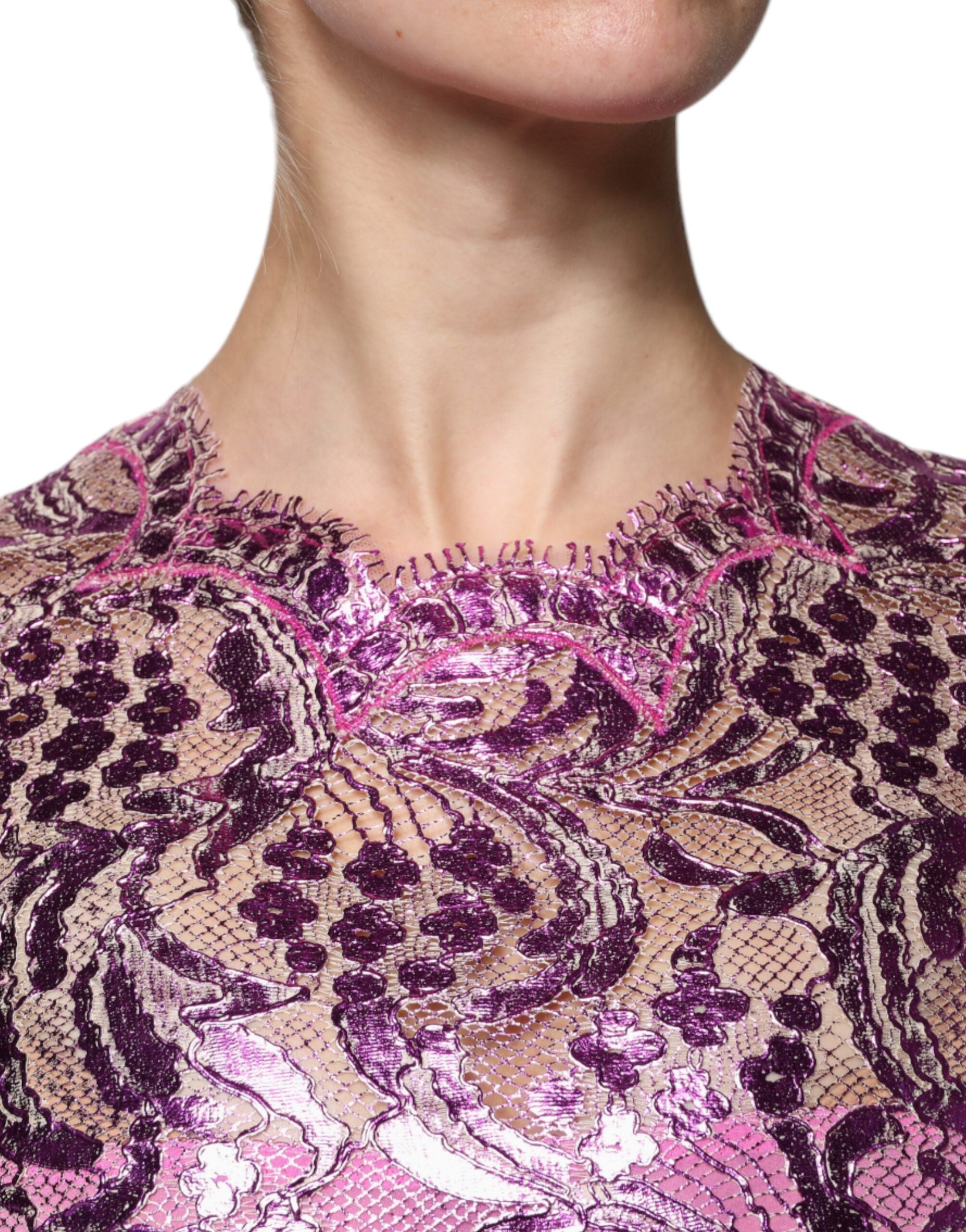 Indulge in the Dolce & Gabbana Metallic Fuchsia Floral Sheath Mini Dress, where exquisite Italian craftsmanship meets luxurious materials for an enchanting statement.