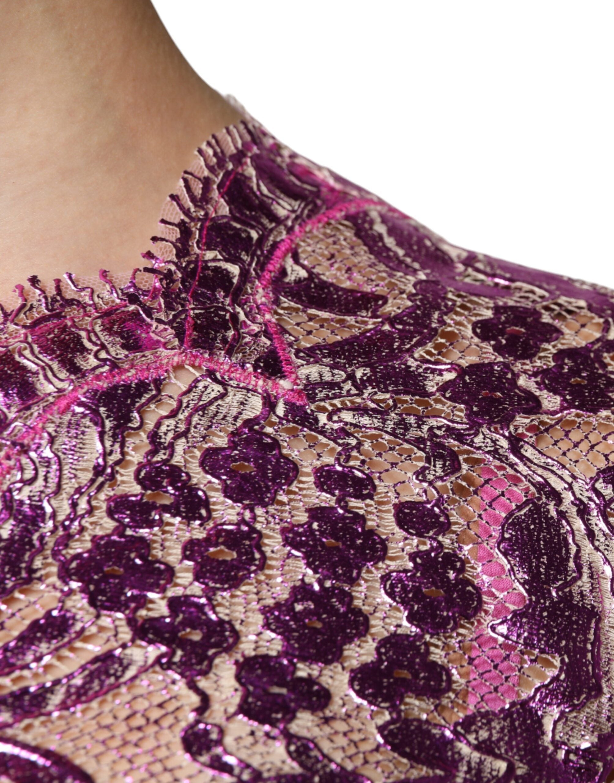Indulge in the exquisite Dolce & Gabbana Metallic Fuchsia Floral Sheath Mini Dress, a luxurious blend of silk and cotton that embodies timeless elegance and refined Italian craftsmanship.