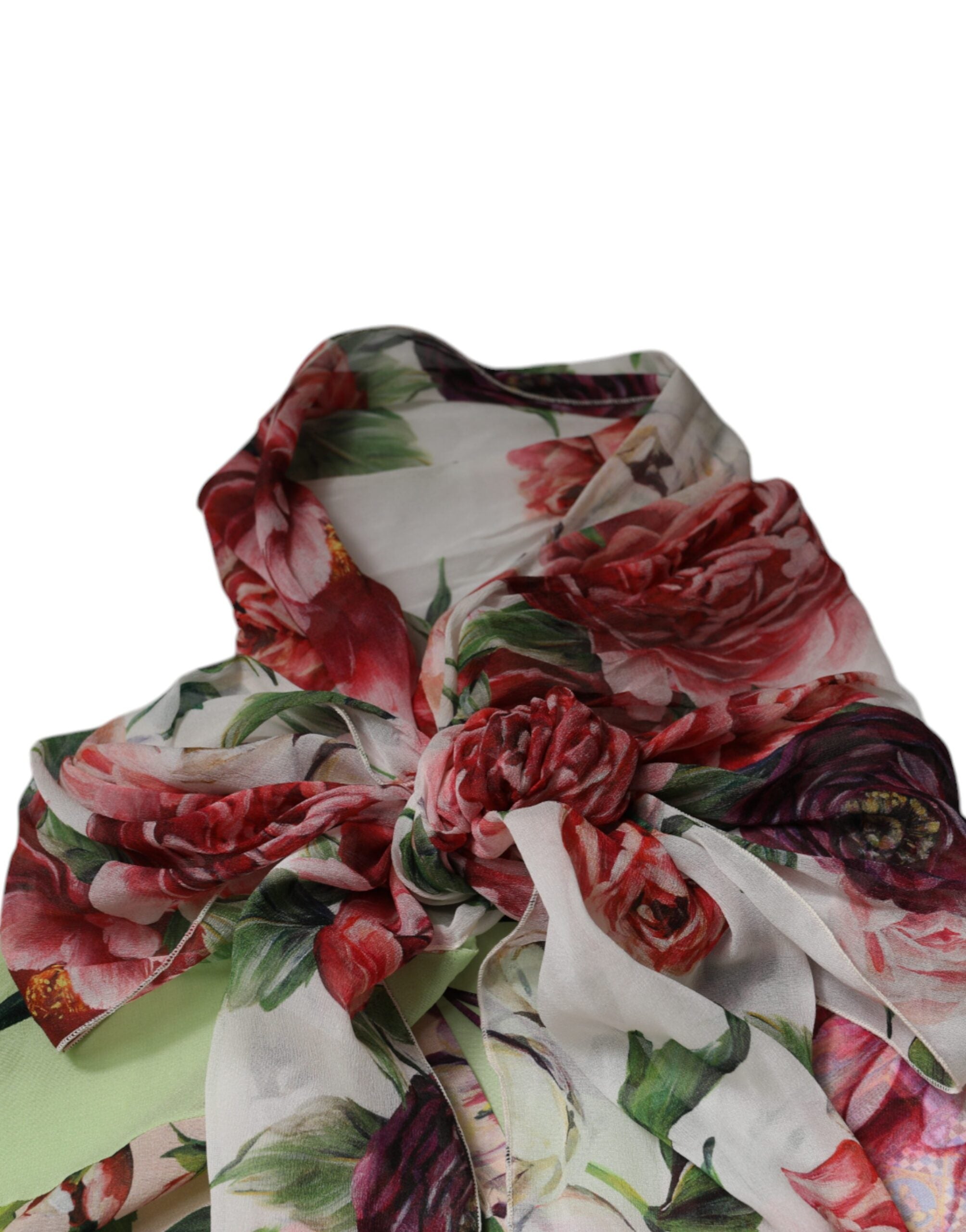 Indulge in the exquisite Dolce & Gabbana Multicolor Floral Patchwork Ascot Collar Top, a silk masterpiece that embodies luxury and sophistication for the discerning individual.
