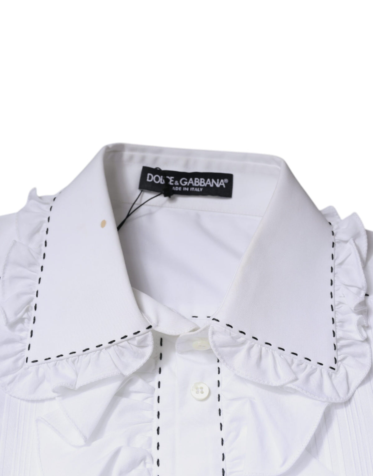 Experience timeless elegance with the Dolce & Gabbana White Cotton Long Sleeves Ruffle Collar Top, a masterpiece of Italian craftsmanship that embodies sophistication and allure.